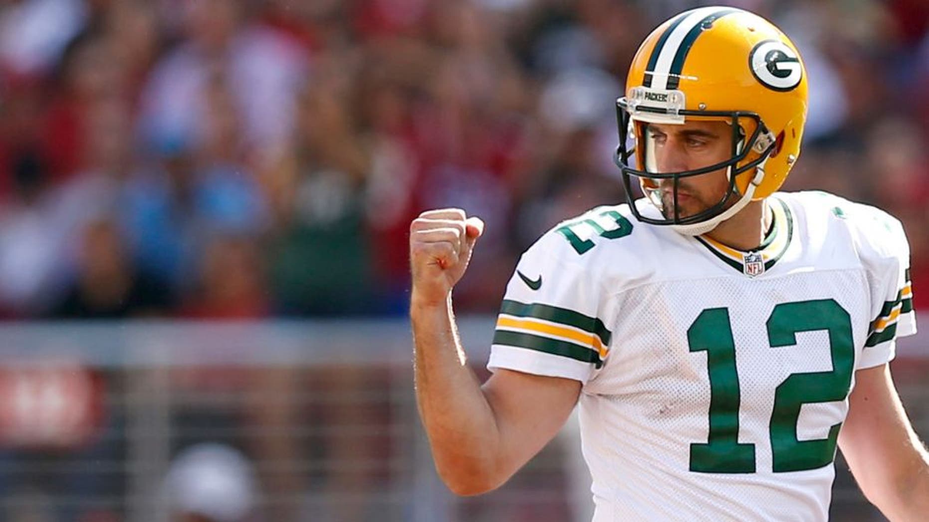 SANTA CLARA, CA - OCTOBER 04: Quarterback Aaron Rodgers #12 of the Green Bay Packers reacts to a first down against the San Francisco 49ers during their NFL game at Levi's Stadium on October 4, 2015 in Santa Clara, California. (Photo by Ezra Shaw/Getty Images)