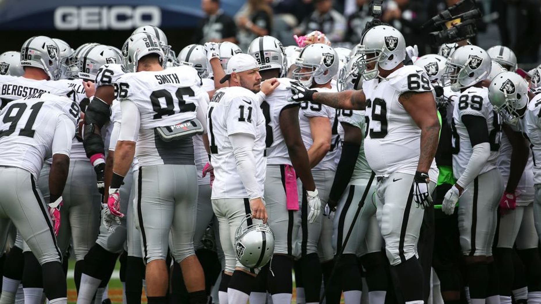 CHICAGO, IL - OCTOBER 04: The Oakland Raiders huddle up prior to the game against the Chicago Bears at Soldier Field on October 4, 2015 in Chicago, Illinois. (Photo by Jonathan Daniel/Getty Images)