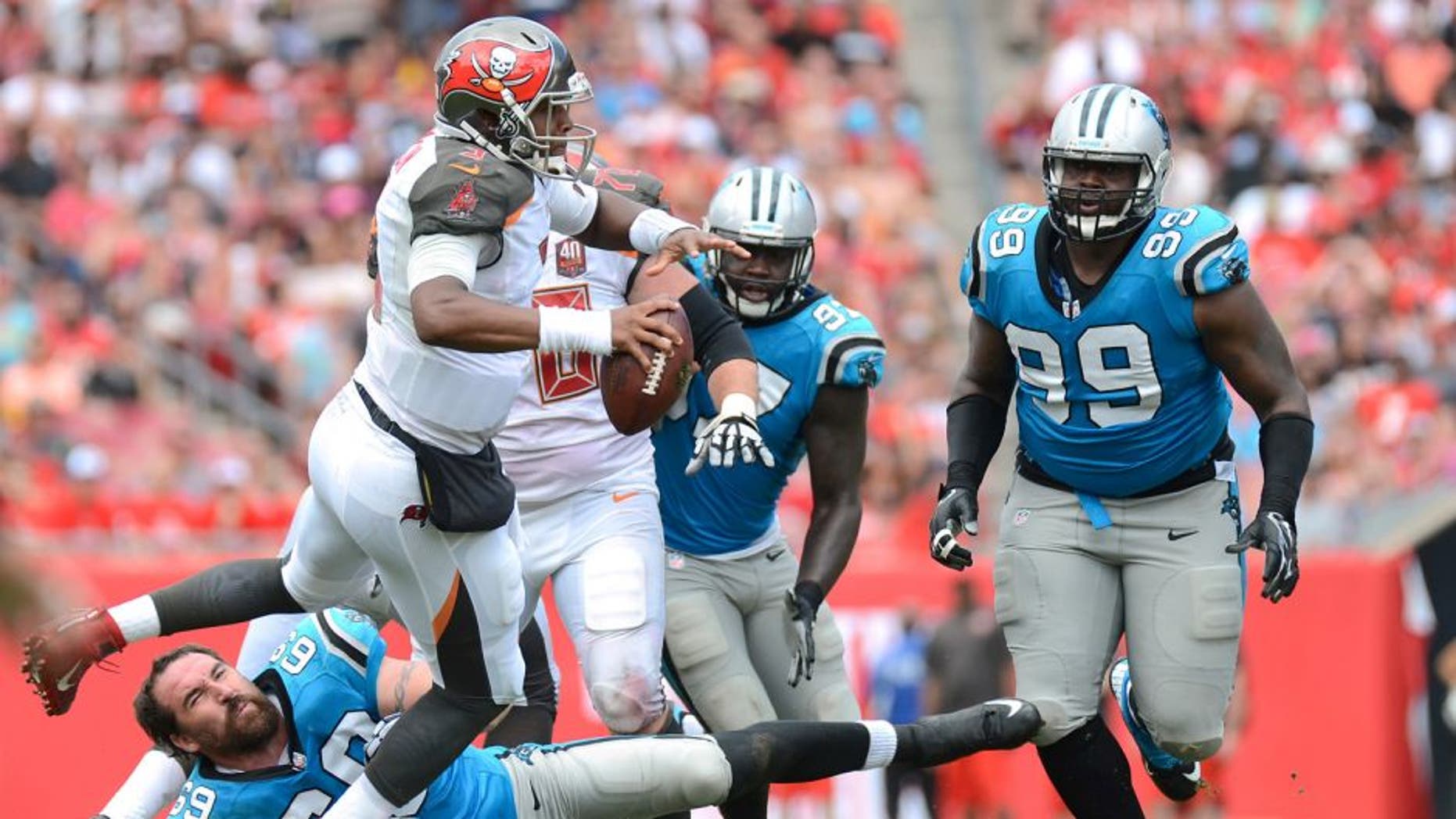 Oct 4, 2015; Tampa, FL, USA; Tampa Bay Buccaneers quarterback Jameis Winston (3) runs with the ball in the first half against the Carolina Panthers at Raymond James Stadium. Mandatory Credit: Jonathan Dyer-USA TODAY Sports