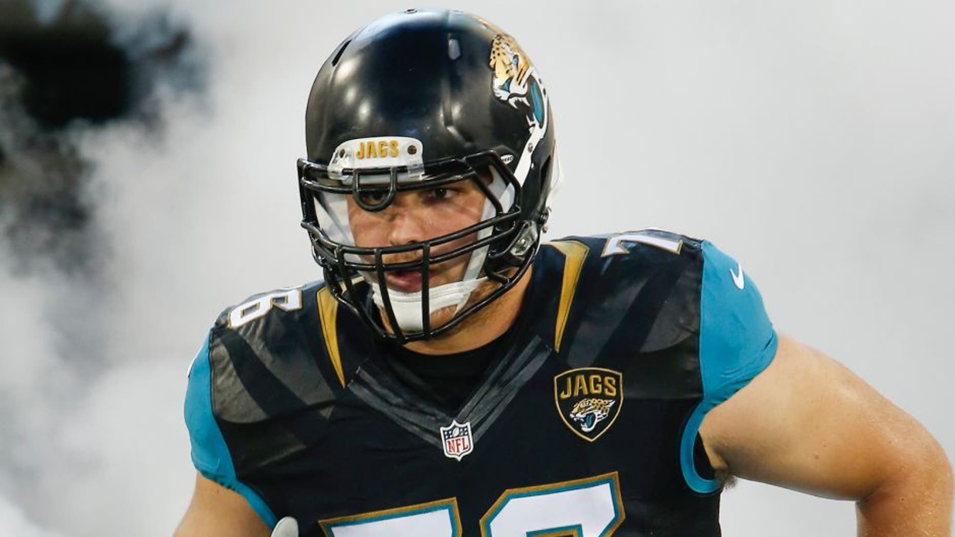 Aug 28, 2016; Jacksonville, FL, USA; Jacksonville Jaguars tackle Luke Joeckel (76) runs out of the tunnel before the first quarter of a football game against the Cincinnati Bengals at EverBank Field. Mandatory Credit: Reinhold Matay-USA TODAY Sports