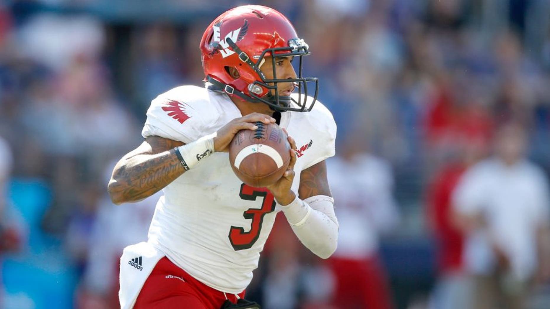 SEATTLE, WA - SEPTEMBER 06: Quarterback Vernon Adams Jr. #3 of the Eastern Washington Eagles looks downfield to pass against the Washington Huskies on September 6, 2014 at Husky Stadium in Seattle, Washington. (Photo by Otto Greule Jr/Getty Images)