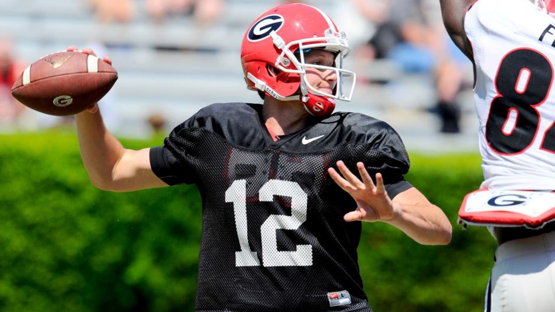 Apr 12, 2014; Athens, GA, USA; Georgia Bulldogs quarterback Brice Ramsey (12) passes the ball during the second half of the Georgia Spring Game at Sanford Stadium. The Red team won 27-24. Mandatory Credit: Dale Zanine-USA TODAY Sports