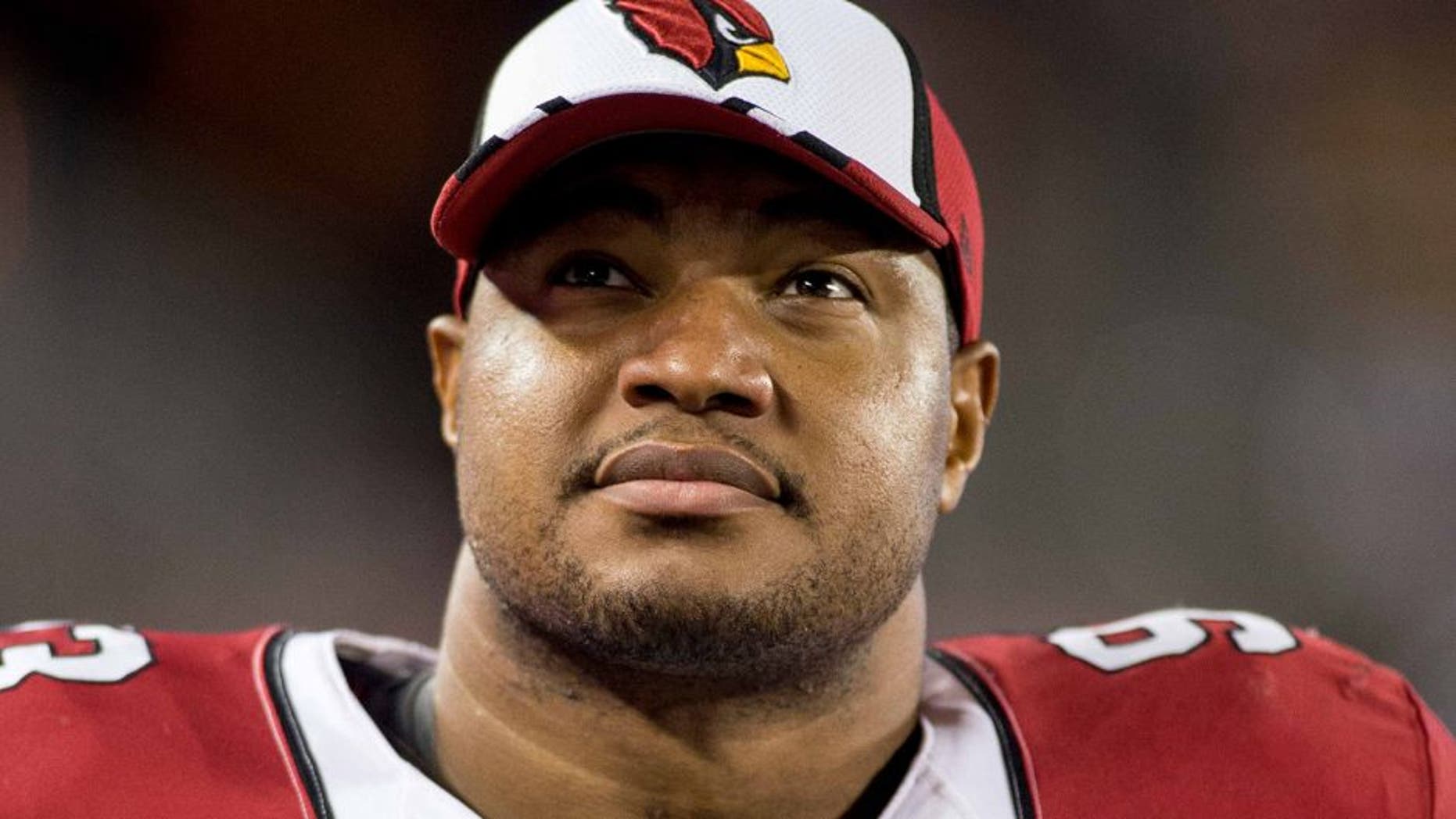 Aug 16, 2014; Minneapolis, MN, USA; Arizona Cardinals defensive end Calais Campbell (93) rests along the sidelines in the game with the Minnesota Vikings at TCF Bank Stadium. Mandatory Credit: Bruce Kluckhohn-USA TODAY Sports