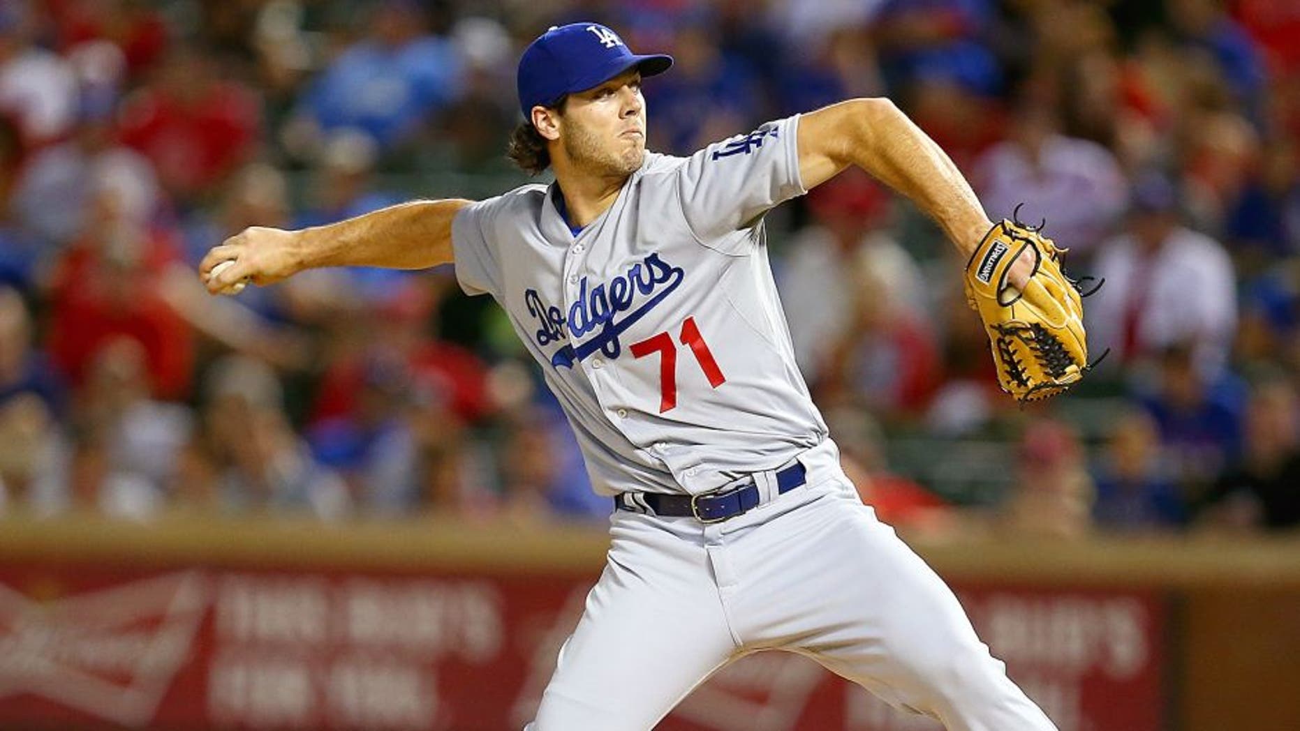 ARLINGTON, TX - JUNE 16: Josh Ravin #71 of the Los Angeles Dodgers pitches in the ninth inning during a game against the Texas Rangers at Globe Life Park in Arlington on June 16, 2015 in Arlington, Texas. The Texas Rangers defeated the Los Angeles Dodgers 3-2. (Photo by Sarah Crabill/Getty Images)