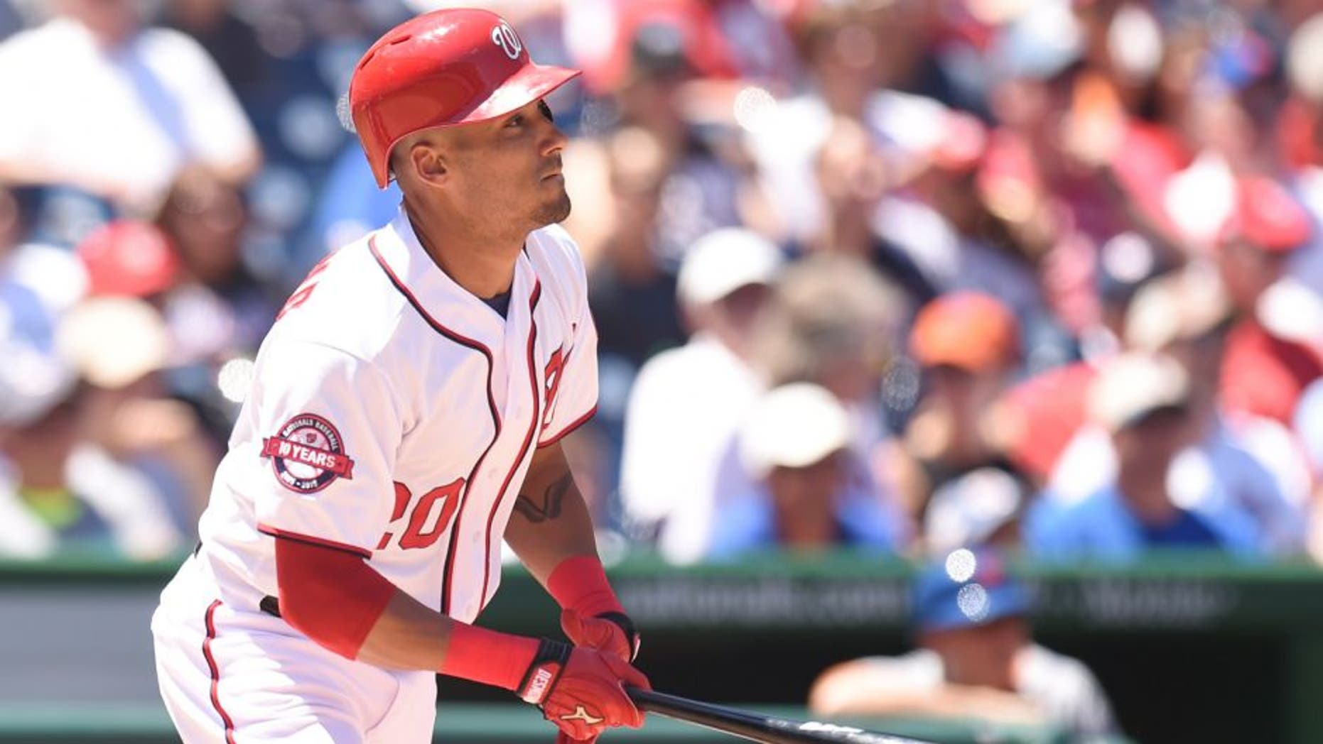 WASHINGTON, DC - JULY 22: Ian Desmond #20 of the Washington Nationals takes a swing during a baseball game against the New York Mets at Nationals Park on July 22, 2015 in Washington, DC. The Nationals won 4-3. (Photo by Mitchell Layton/Getty Images)