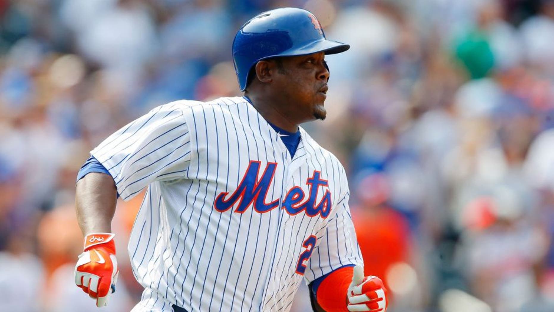 NEW YORK, NY - AUGUST 30: Juan Uribe #2 of the New York Mets in action against the bb at Citi Field on August 30, 2015 in the Flushing neighborhood of the Queens borough of New York City. The Mets defeated the Red Sox 5-4. (Photo by Jim McIsaac/Getty Images)