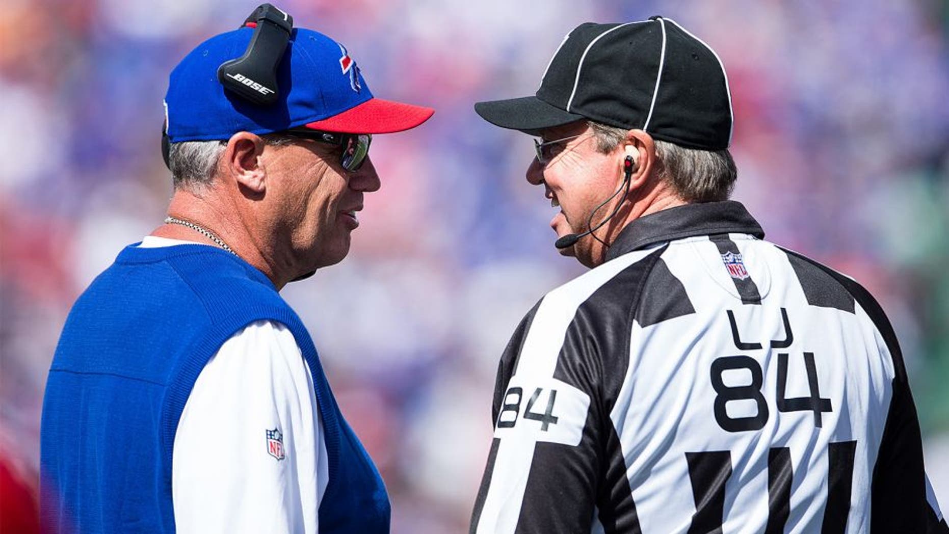 ORCHARD PARK, NY - SEPTEMBER 20: Head coach Rex Ryan of the Buffalo Bills speaks with line judge Mark Steinkerchner #84 during the first half against the New England Patriots on September 20, 2015 at Ralph Wilson Stadium in Orchard Park, New York. New England defeats Buffalo 40-32. (Photo by Brett Carlsen/Getty Images)