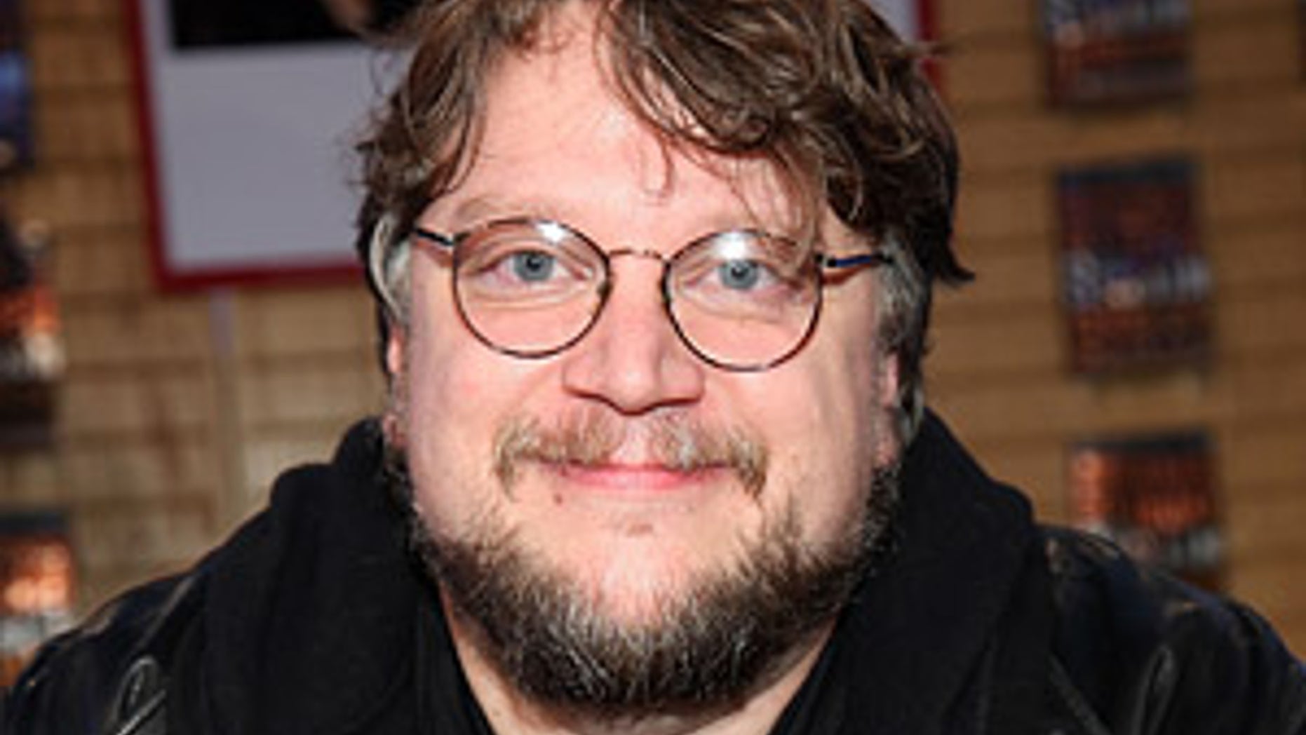 Director Guillermo del Toro poses at the book signing for his new book "The Strain" at Borders Books & Music on June 2, 2009 in Los Angeles, California.
Guillermo del Toro Signs Copies Of His New Book "The Strain" - Los Angeles
Borders Books & Music
Westwood, Los Angeles, CA United States
June 2, 2009
Photo by Brian To/FilmMagic.com
To license this image (57589145), contact FilmMagic.com