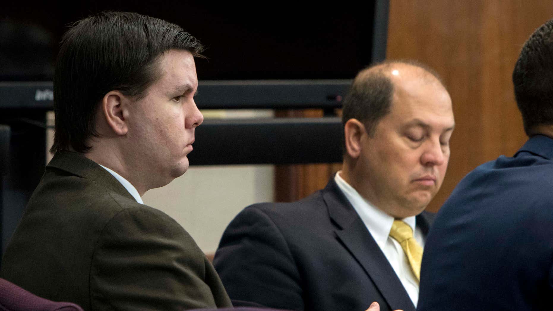 Oct. 3, 2016: Justin Ross Harris, left, listens to jury selection during his murder trial at the Glynn County Courthouse in Brunswick, Ga.