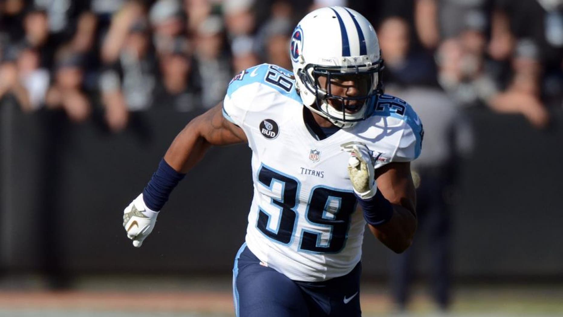 November 24, 2013; Oakland, CA, USA; Tennessee Titans strong safety Daimion Stafford (39) runs during the second quarter against the Oakland Raiders at O.co Coliseum. The Titans defeated the Raiders 23-19. Mandatory Credit: Kyle Terada-USA TODAY Sports