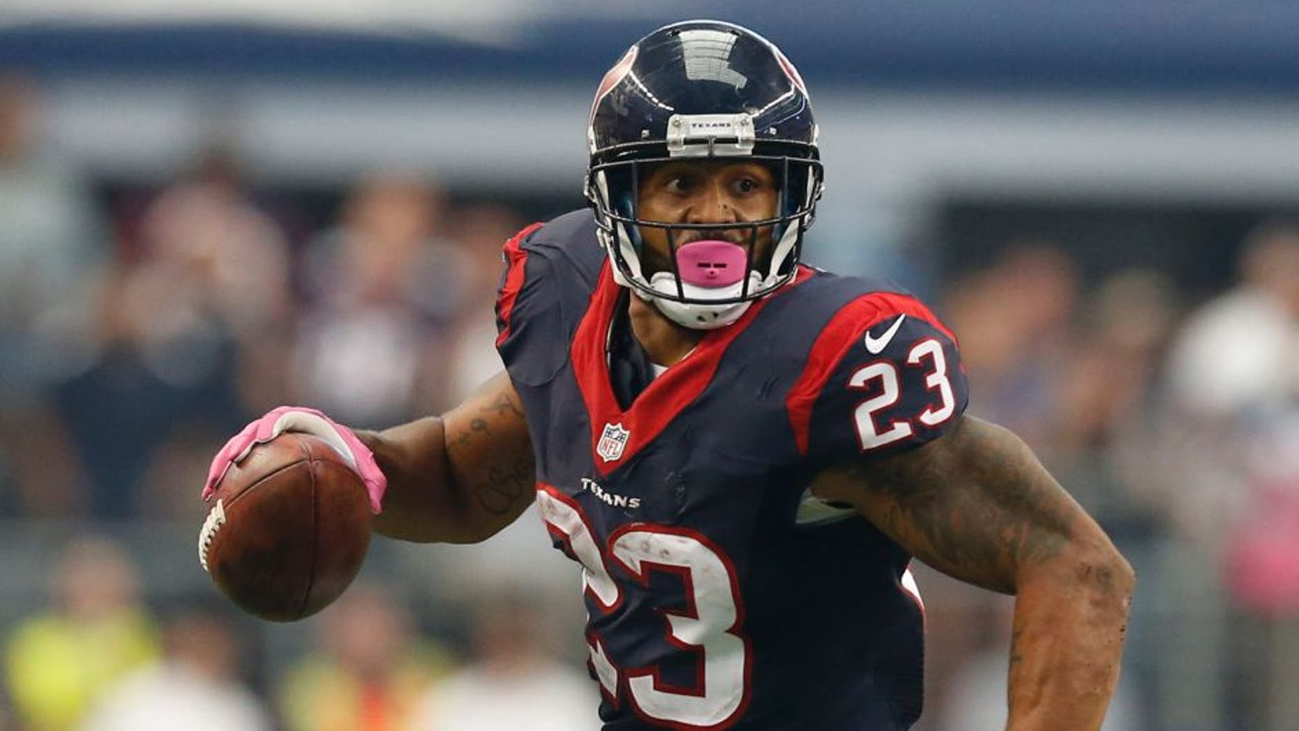 Oct 5, 2014; Arlington, TX, USA; Houston Texans running back Arian Foster (23) runs with the ball against the Dallas Cowboys at AT&T Stadium. The Cowboys beat the Texans 20-17 in overtime. Mandatory Credit: Matthew Emmons-USA TODAY Sports