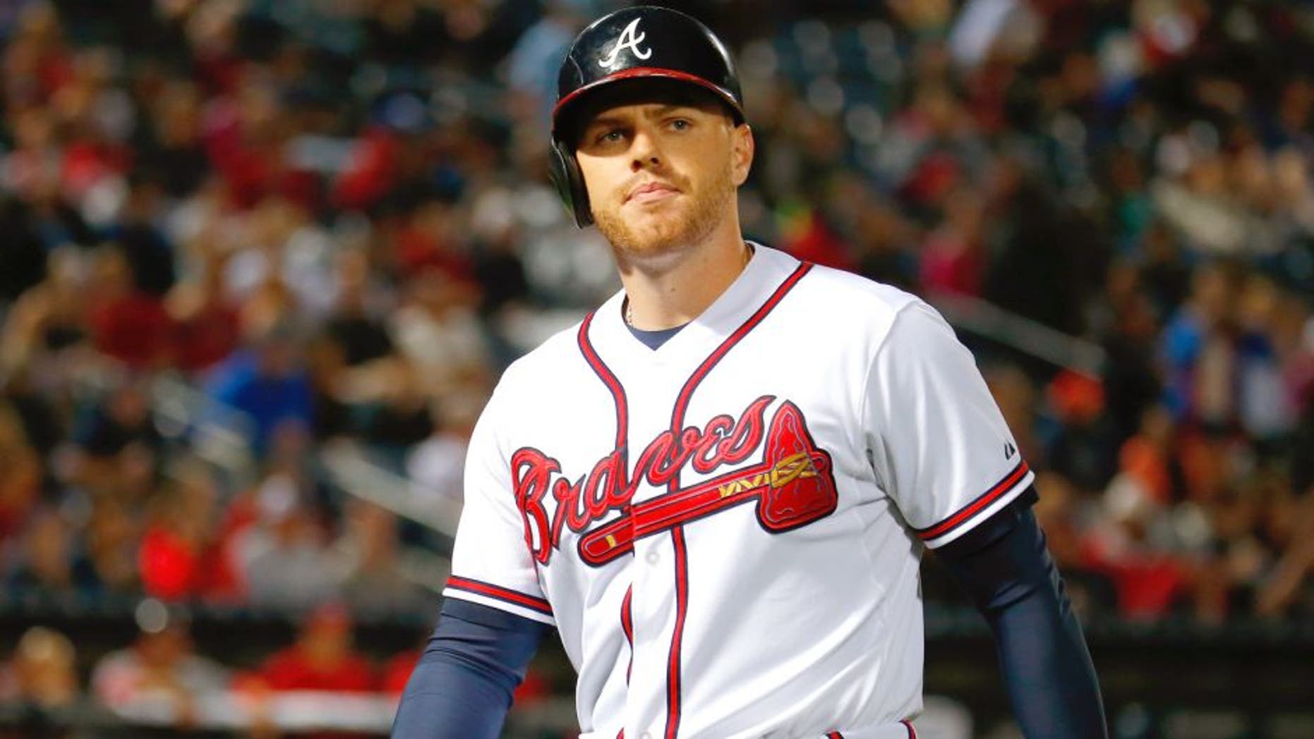 Freddie Freeman #5 of the Atlanta Braves reacts after flying out in the seventh inning against the Washington Nationals at Turner Field on October 1, 2015 in Atlanta, Georgia. (Photo by Kevin C. Cox/Getty Images)