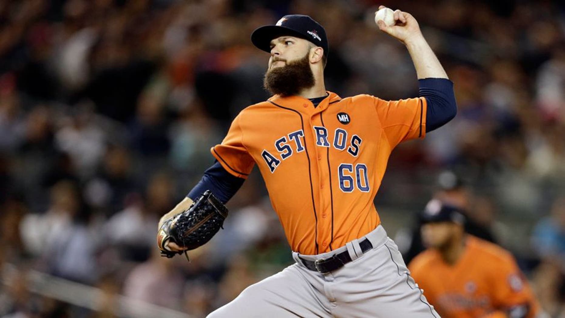 Oct 6, 2015; Bronx, NY, USA; Houston Astros starting pitcher Dallas Keuchel (60) throws against the New York Yankees during the first inning in the American League Wild Card playoff baseball game at Yankee Stadium. Mandatory Credit: Adam Hunger-USA TODAY Sports