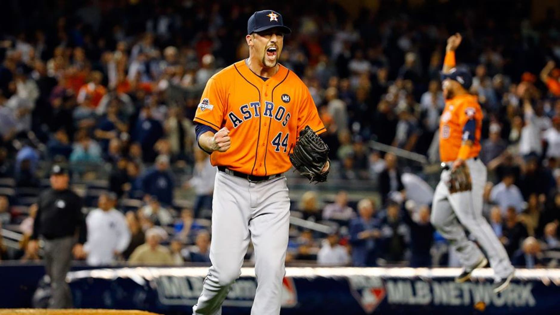 NEW YORK, NY - OCTOBER 06: Luke Gregerson #44 of the Houston Astros celebrates defeating the New York Yankees in the American League Wild Card Game at Yankee Stadium on October 6, 2015 in New York City. The Astros defeated the Yankees with a score of 3 to 0. (Photo by Al Bello/Getty Images)
