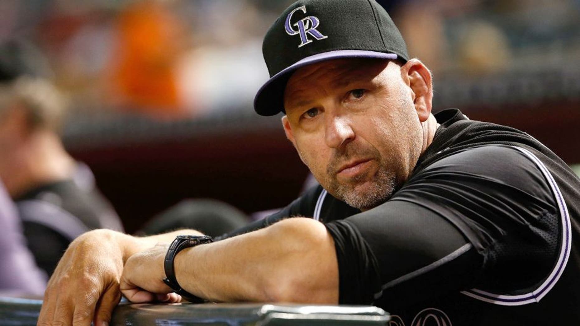 PHOENIX, AZ - SEPTEMBER 30: Manager Walt Weiss #22 of the Colorado Rockies looks on from the dugout during the MLB game against the Arizona Diamondbacks at Chase Field on September 30, 2015 in Phoenix, Arizona. (Photo by Christian Petersen/Getty Images)
