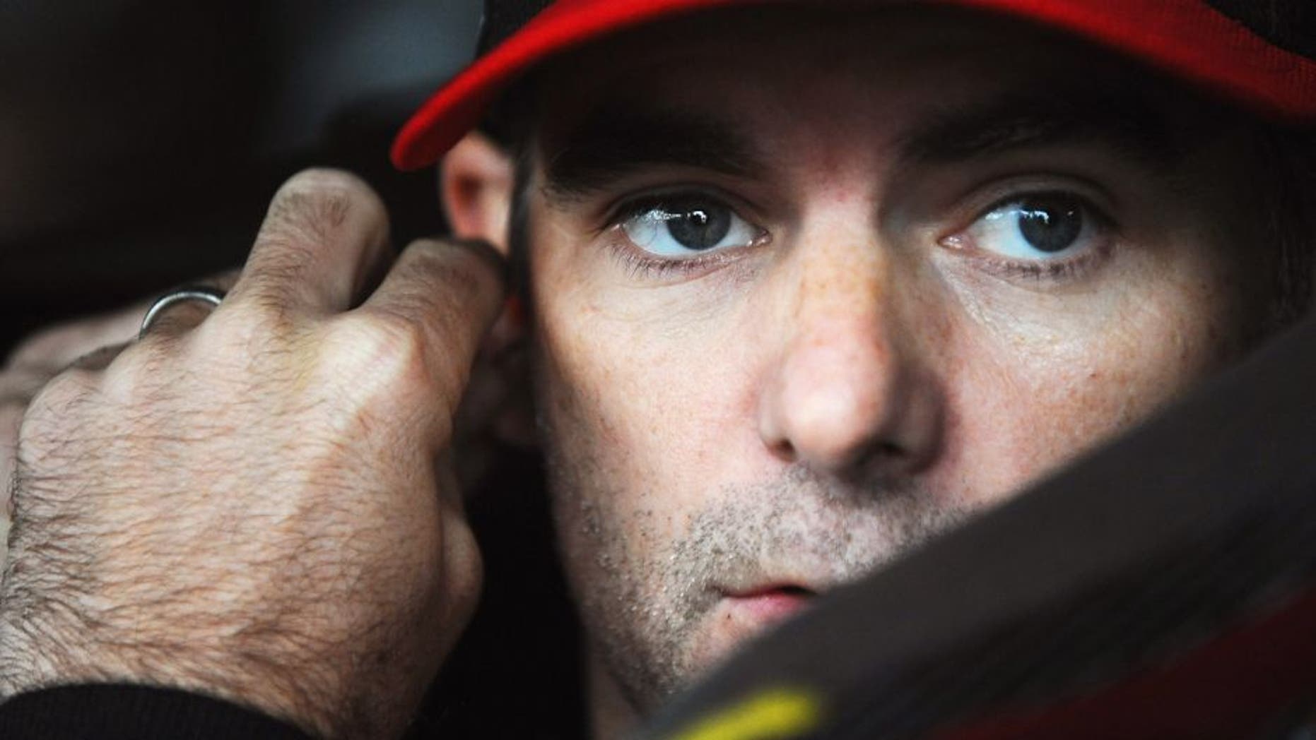 Jeff Gordon, driver of the #24 AARP Member Advantages Chevrolet, sits in his car during practice for the NASCAR Sprint Cup Series AAA 400 at Dover International Speedway on October 3, 2015 in Dover, Delaware. (Photo by Rainier Ehrhardt/NASCAR via Getty Images)