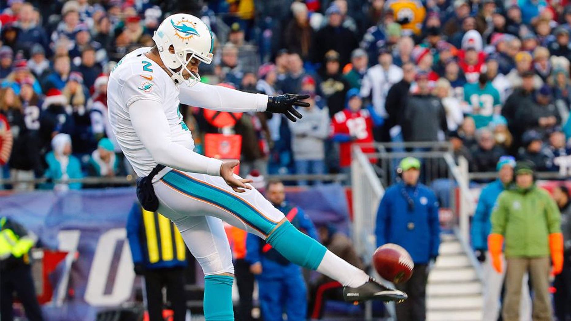 Dec 14, 2014; Foxborough, MA, USA; Miami Dolphins punter Brandon Fields (2) during the second half of the New England Patriots 41-13 win over the Miami Dolphins at Gillette Stadium. Mandatory Credit: Winslow Townson-USA TODAY Sports