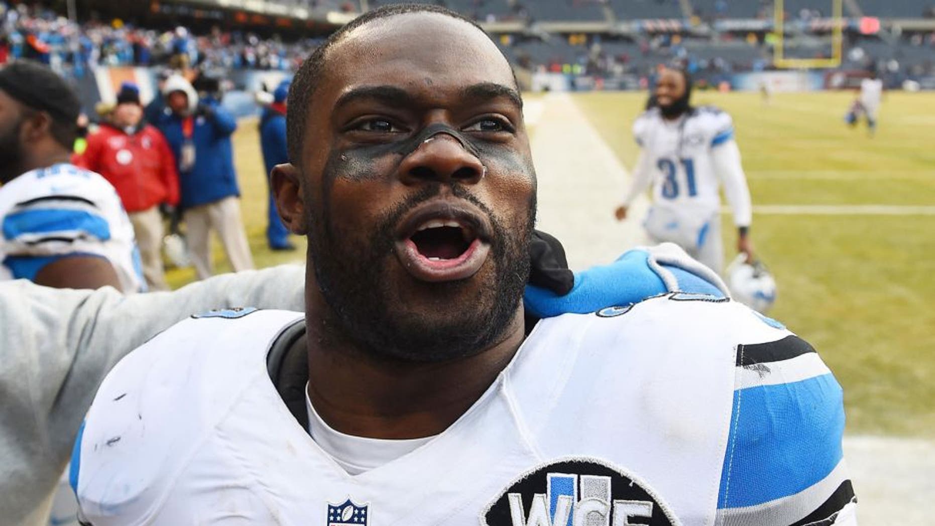 Dec 21, 2014; Chicago, IL, USA; Detroit Lions strong safety James Ihedigbo (32) reacts after the game against the Chicago Bears at Soldier Field. Detroit Lions defeat the Chicago Bears 20-14. Mandatory Credit: Mike DiNovo-USA TODAY Sports
