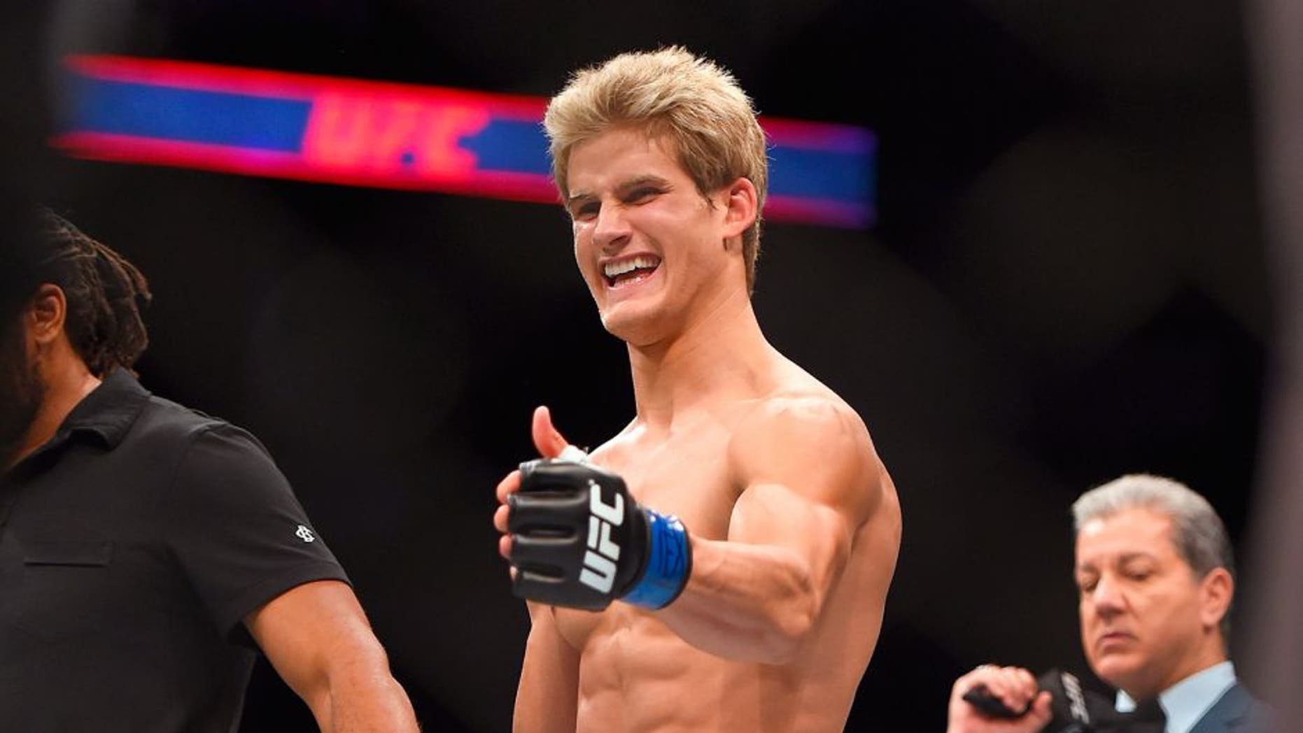 HOUSTON, TX - OCTOBER 03: Sage Northcutt celebrates after defeating Francisco Trevino in their lightweight bout during the UFC 192 event at the Toyota Center on October 3, 2015 in Houston, Texas. (Photo by Jeff Bottari/Zuffa LLC/Zuffa LLC via Getty Images)