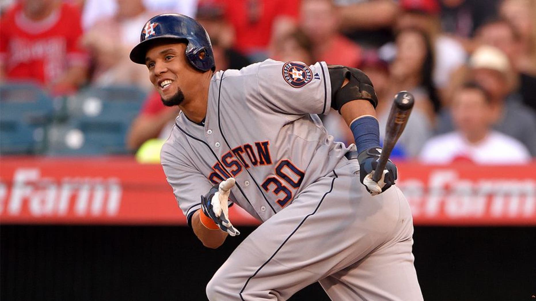 ANAHEIM, CA - SEPTEMBER 12: Carlos Gomez #30 of the Houston Astros runs during the first inning of the game against the Los Angeles Angels of Anaheim at Angel Stadium of Anaheim on September 12, 2015 in Anaheim, California. (Photo by Matt Brown/Angels Baseball LP/Getty Images)