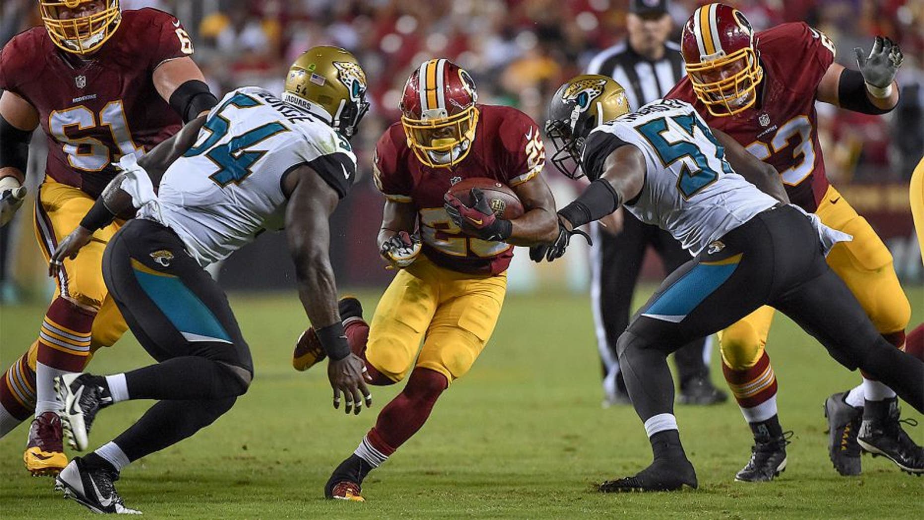 LANDOVER, MD - SEPTEMBER 3: Washington Redskins running back Chris Thompson (25) carries the ball for yardage during the fourth quarter in a NFL preseason game between the Washington Redskins and Jacksonville Jaguars at FedEx Field on September 3, 2015 in Landover, Md. (Photo by Ricky Carioti/The Washington Post via Getty Images)