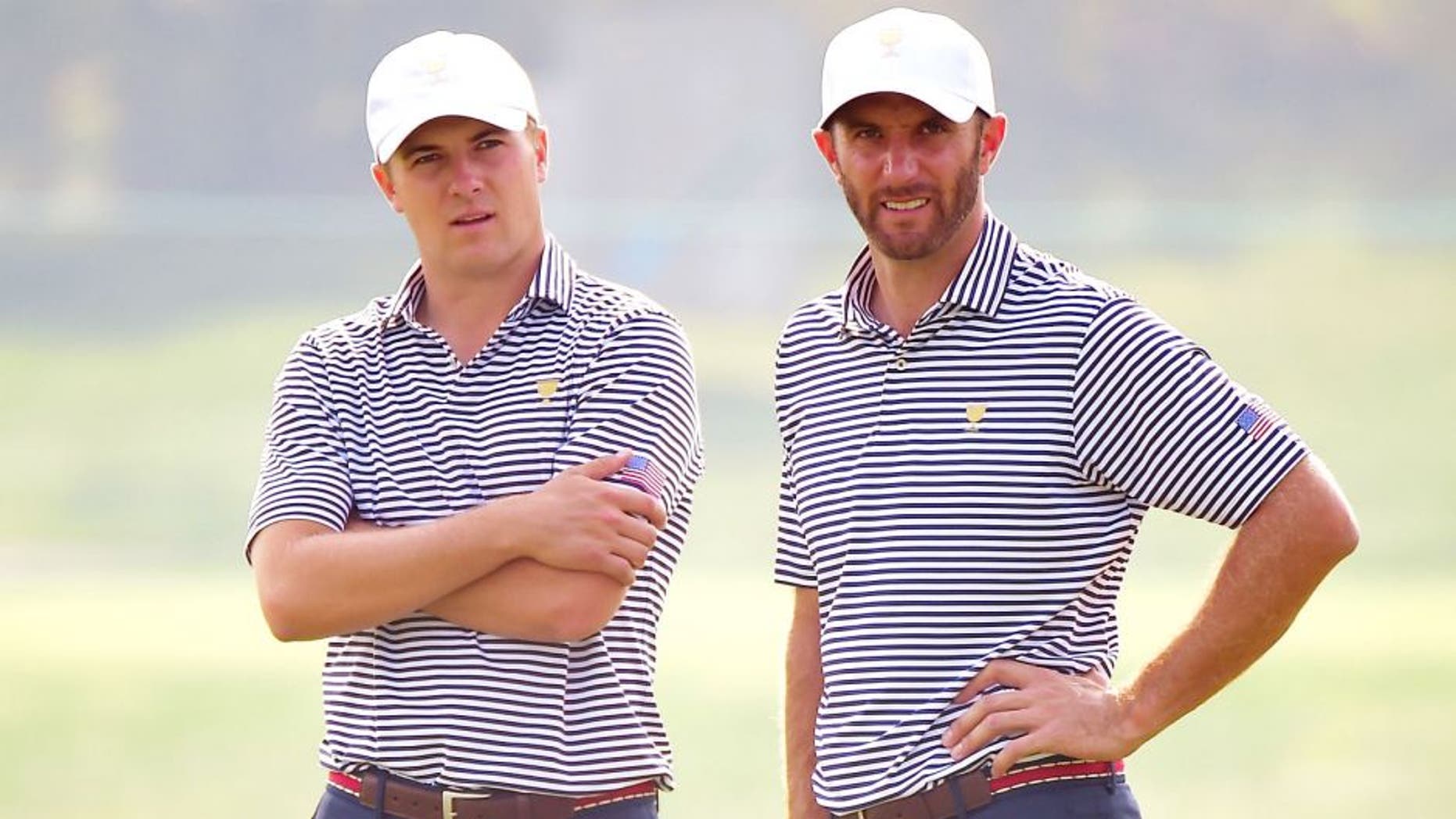 INCHEON CITY , SOUTH KOREA - OCTOBER 07: Dustin Johnson and Jordan Spieth of the United States team look over a green during a practice round prior to the start of The Presidents Cup at the Jack Nicklaus Golf Club on October 7, 2015 in Incheon City, South Korea. (Photo by Harry How/Getty Images)