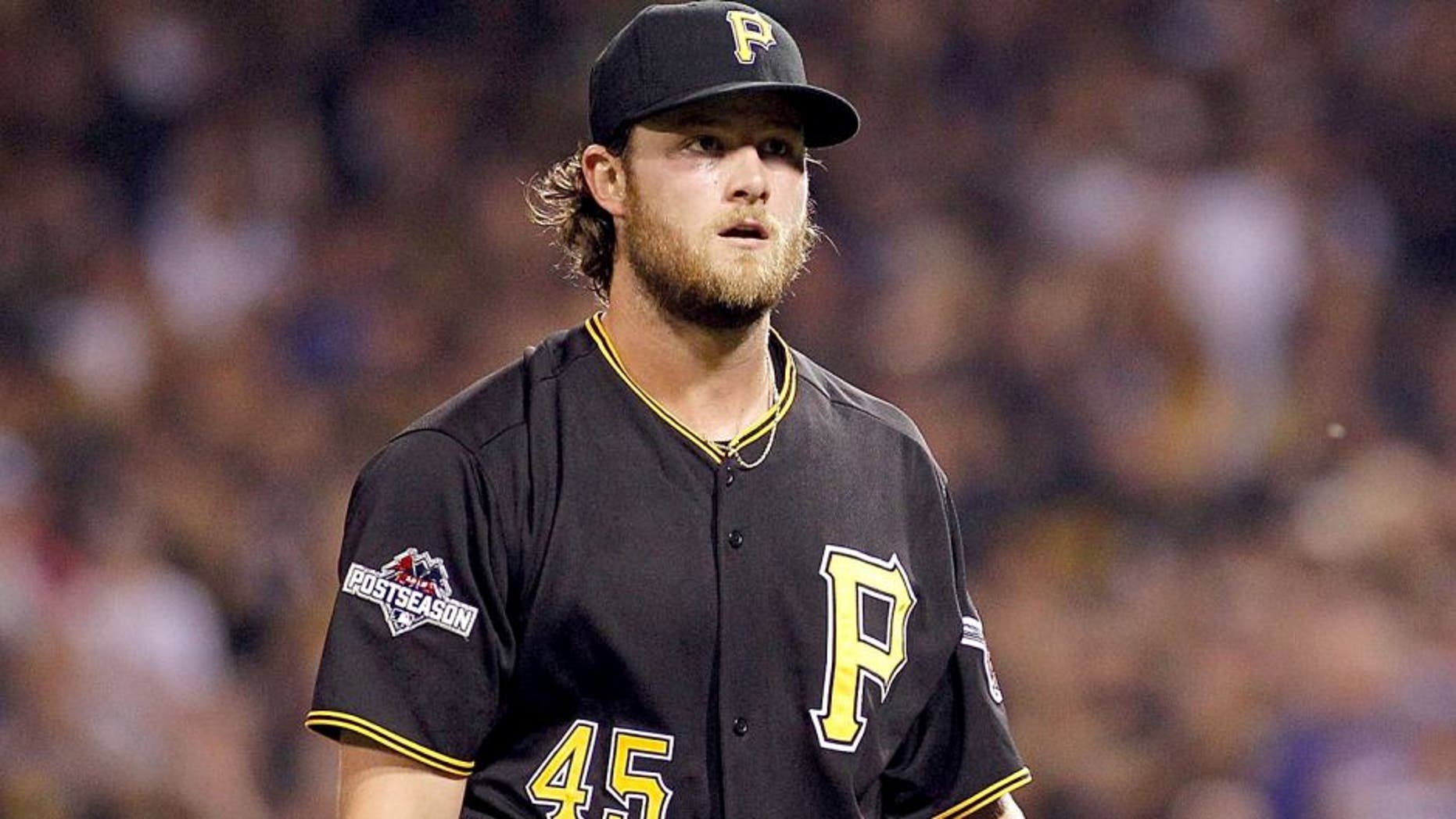 PITTSBURGH, PA - OCTOBER 07: Gerrit Cole #45 of the Pittsburgh Pirates walks off the field after the first inning against the Chicago Cubs during the National League Wild Card game at PNC Park on October 7, 2015 in Pittsburgh, Pennsylvania. (Photo by Justin K. Aller/Getty Images)