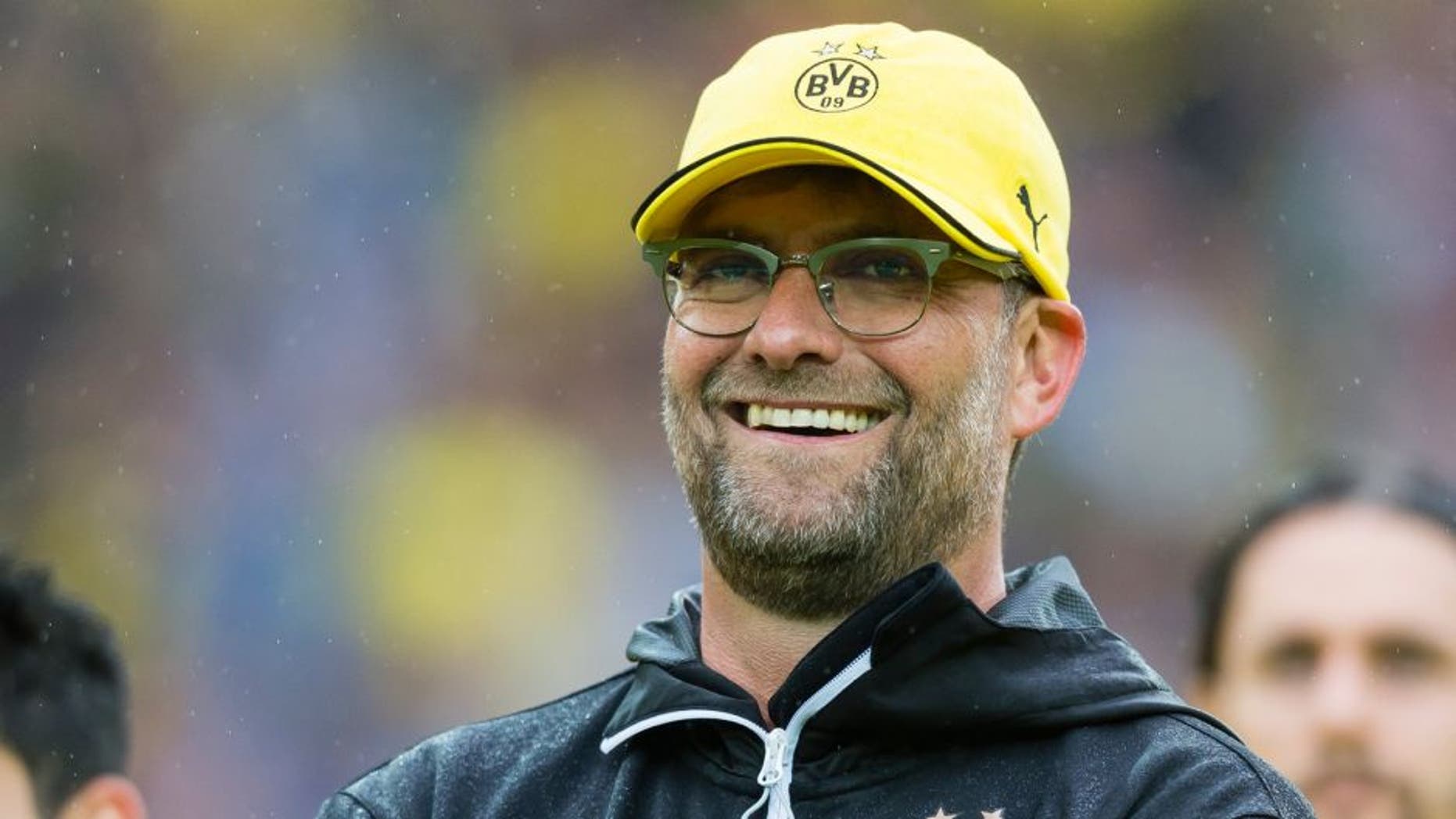 DORTMUND, GERMANY - May 23: Head coach Juergen Klopp of Borussia Dortmund is saying goodbye to the fans after the final whistle of his last home match for Borussia Dortmund during the Bundesliga match between Borussia Dortmund and SV Werder Bremen at Signal Iduna Park on May 23, 2015 in Dortmund, Germany. (Photo by Alexandre Simoes/Borussia Dortmund/Getty Images)