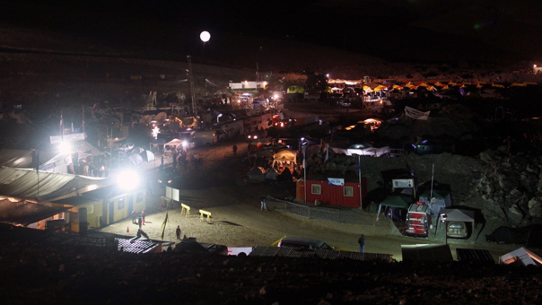 Oct. 8: An illuminated balloon hovers over the camp were relatives of a trapped miners wait for news of the rescue effort near the San Jose mine in Copiapo, Chile.
