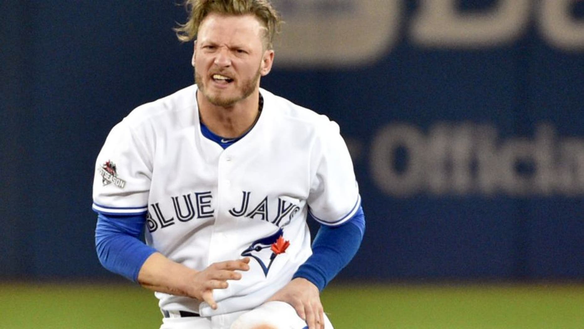 Oct 8, 2015; Toronto, Ontario, CAN; Toronto Blue Jays third baseman Josh Donaldson reacts after being forced out at second base by the Texas Rangers in the fourth inning in game one of the ALDS at Rogers Centre. Mandatory Credit: Nick Turchiaro-USA TODAY Sports