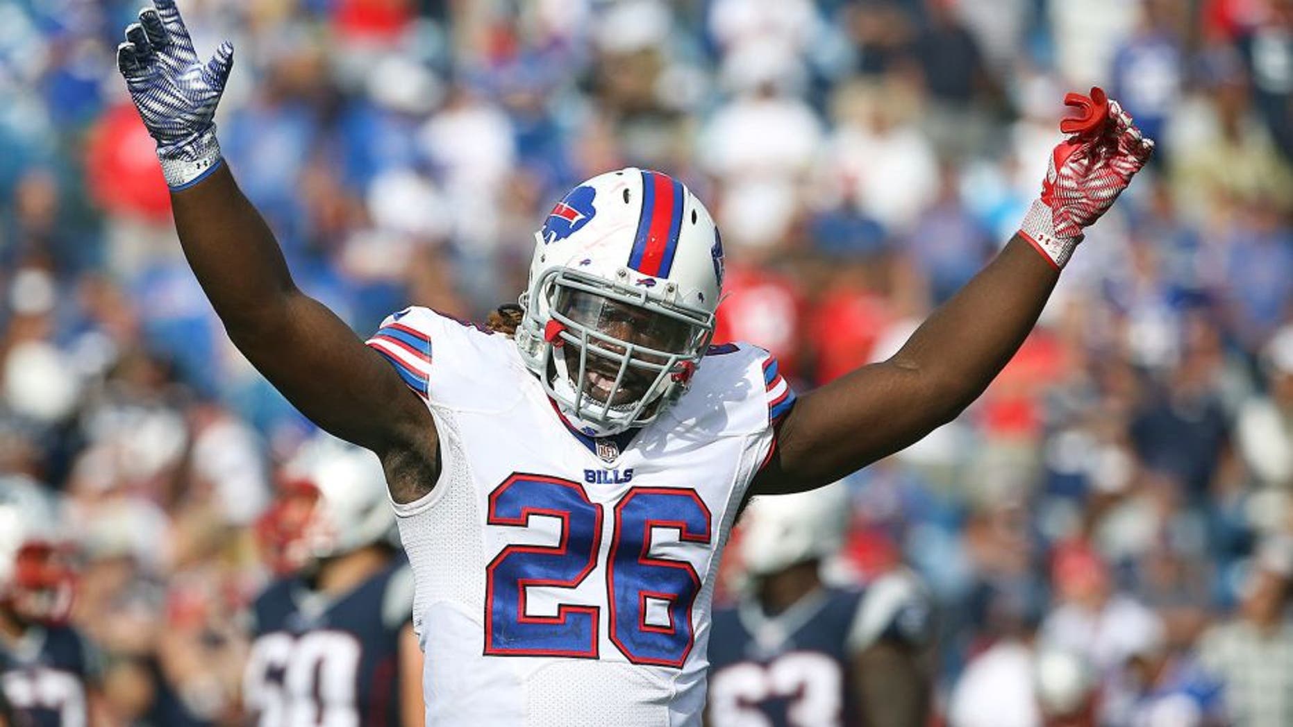 ORCHARD PARK, NY - SEPTEMBER 20: Boobie Dixon #26 of the Buffalo Bills tries to get the crowd fired up during NFL game action against the New England Patriots at Ralph Wilson Stadium on September 20, 2015 in Orchard Park, New York. (Photo by Tom Szczerbowski/Getty Images)