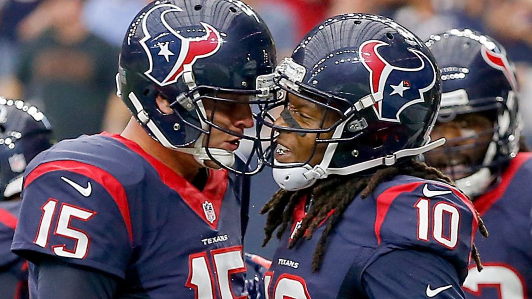 HOUSTON, TX - SEPTEMBER 27: Ryan Mallett #15 of the Houston Texans and DeAndre Hopkins #10 celebrate after a touchdown in the first quarter at NRG Stadium on September 27, 2015 in Houston, Texas. (Photo by Bob Levey/Getty Images)