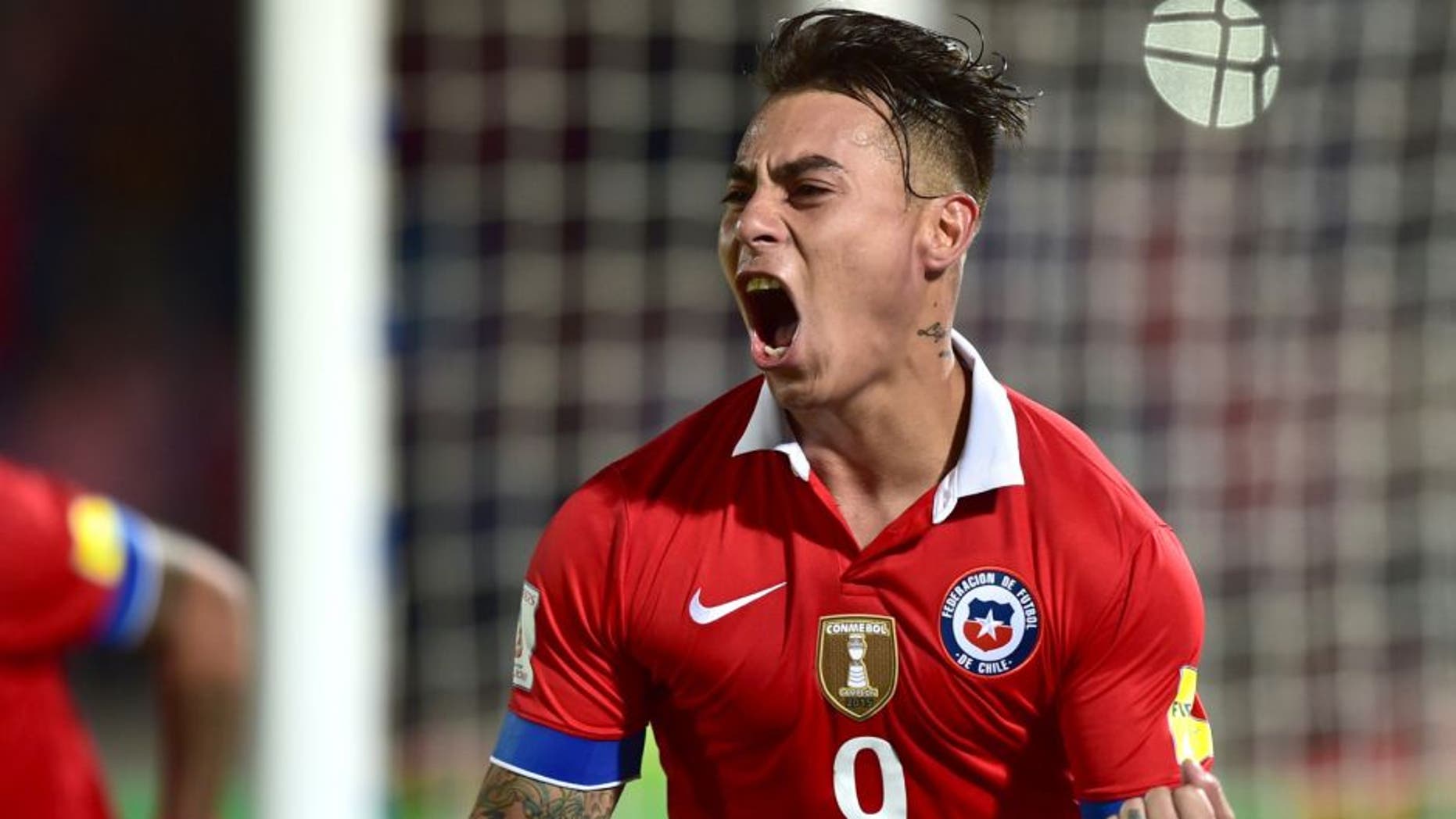 Chile's Eduardo Vargas celebrates after scoring against Brazil during their Russia 2018 FIFA World Cup qualifiers match, at the Nacional stadium in Santiago de Chile, on October 8, 2015. AFP PHOTO / MARTIN BERNETTI (Photo credit should read MARTIN BERNETTI/AFP/Getty Images)