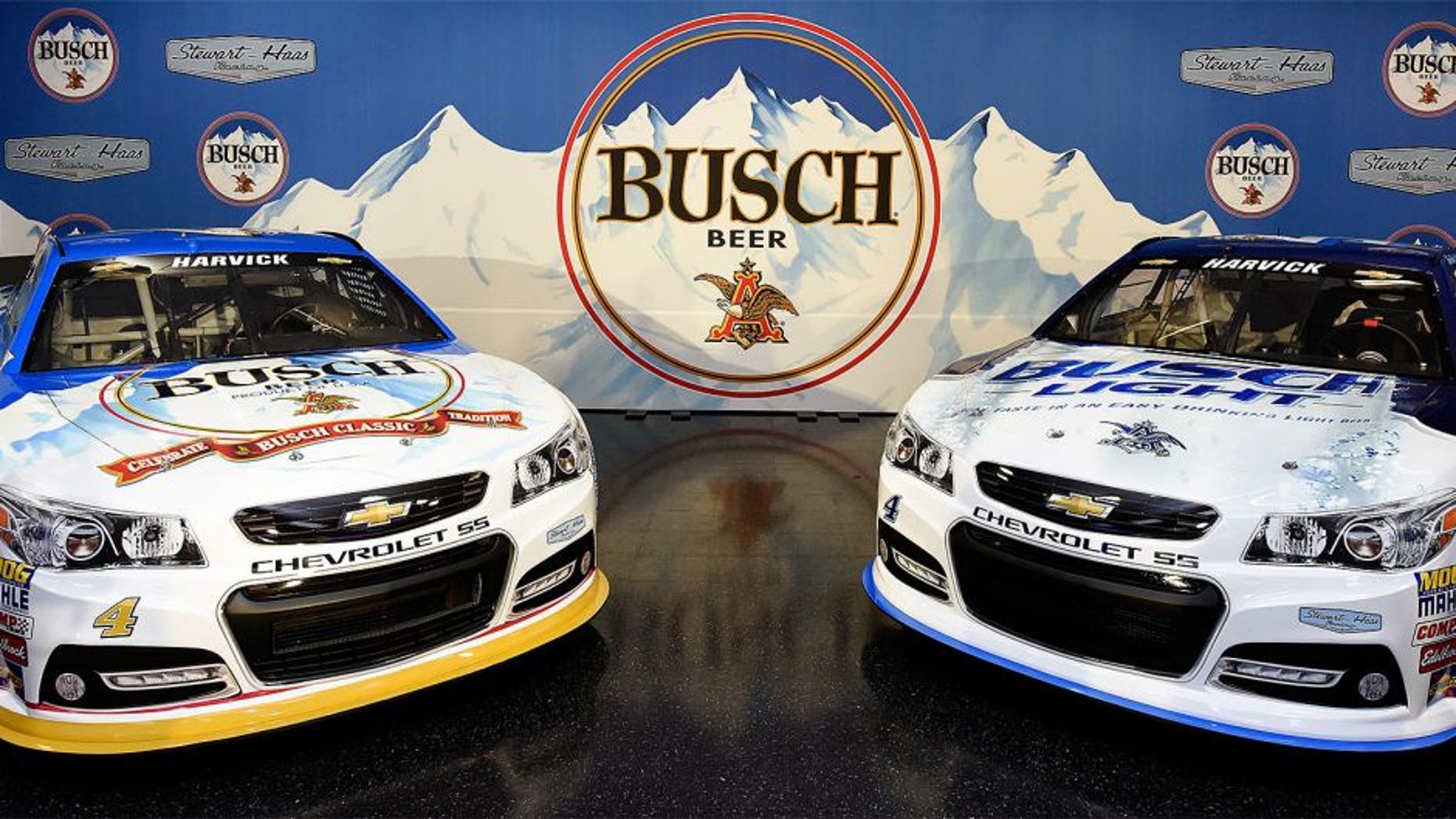 KANNAPOLIS, NC - OCTOBER 08: The #4 Busch Chevrolet and the #4 Busch Light Chevrolet sit in the auditorium after a press conference with Busch and Stewart-Haas Racing at Charlotte Motor Speedway on October 8, 2015 in Kannapolis, North Carolina. The brand will return to NASCAR, reigniting its storied history in the sport by sponsoring Kevin Harvick and the No. 4 team of Stewart-Haas Racing for select races beginning with the 2016 NASCAR Sprint Cup Series season. (Photo by Jared C. Tilton/Getty Images for Stewart-Haas Racing)