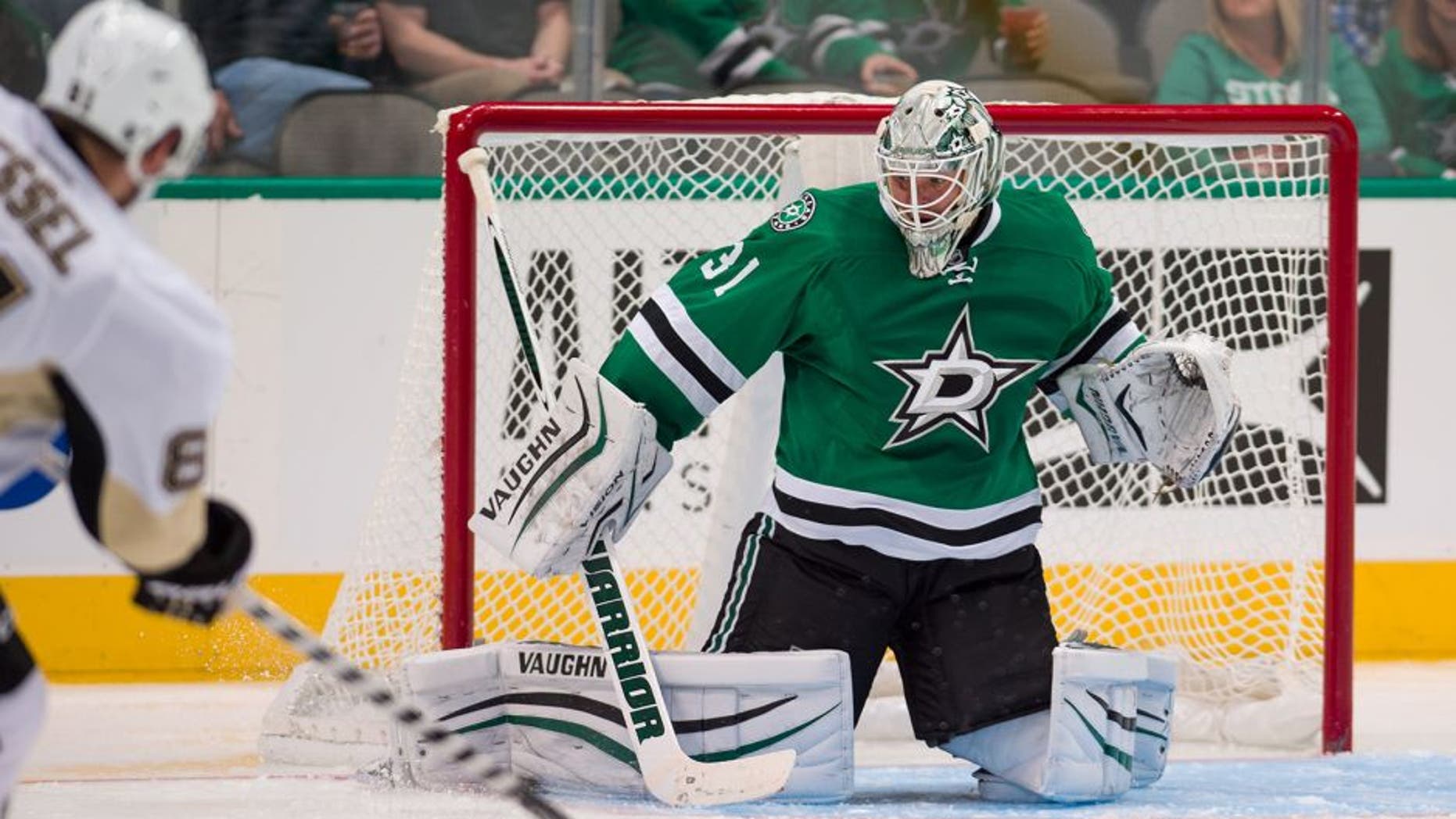Oct 8, 2015; Dallas, TX, USA; Dallas Stars goalie Antti Niemi (31) makes a save against Pittsburgh Penguins right wing Phil Kessel (81) during the third period at American Airlines Center. The Stars won 3-0. Mandatory Credit: Jerome Miron-USA TODAY Sports
