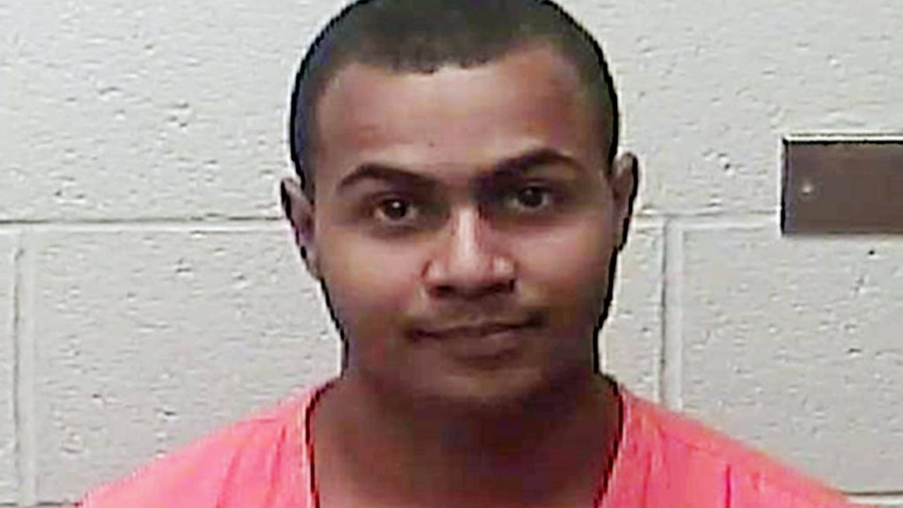 FILE - This undated file photo provided by the Burleigh County Sheriff's Department in Bismarck, N.D., shows Justin Cox-Sever, of Tempe, Ariz. Cox-Sever, a flight attendant accused of fabricating bomb threats on two U.S. flights in 2015, signed a plea deal Saturday, Feb. 25, 2017, with prosecutors to avoid trial but still could spend decades in prison. It still needs approval of a federal judge. (Burleigh County Sheriff's Department via AP, File)