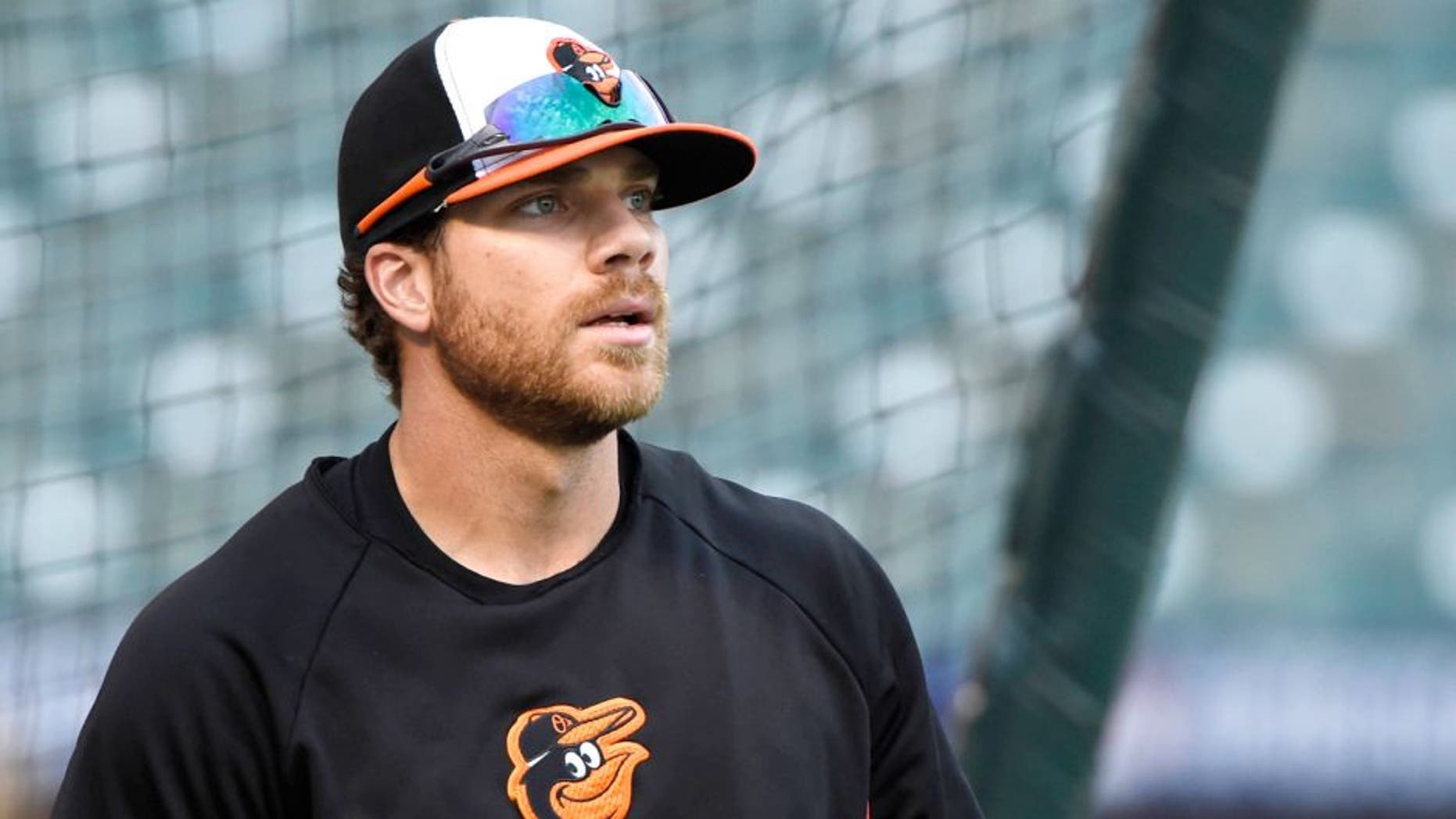 Oct 9, 2014; Baltimore, MD, USA; Baltimore Orioles first baseman Chris Davis (19) walks out of the batting cage during workouts the day before game one of the 2014 ALCS against the against the Kansas City Royals at Oriole Park at Camden Yards. Mandatory Credit: Tommy Gilligan-USA TODAY Sports
