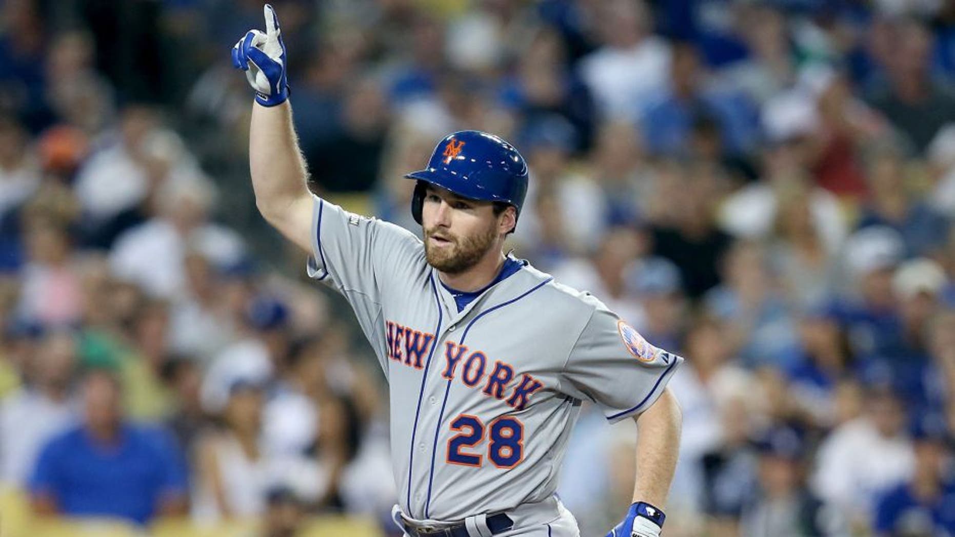 LOS ANGELES, CA - OCTOBER 09: Daniel Murphy #28 of the New York Mets reacts after he hits a solo home run in the fourth inning against the Los Angeles Dodgers in game one of the National League Division Series at Dodger Stadium on October 9, 2015 in Los Angeles, California. (Photo by Stephen Dunn/Getty Images)