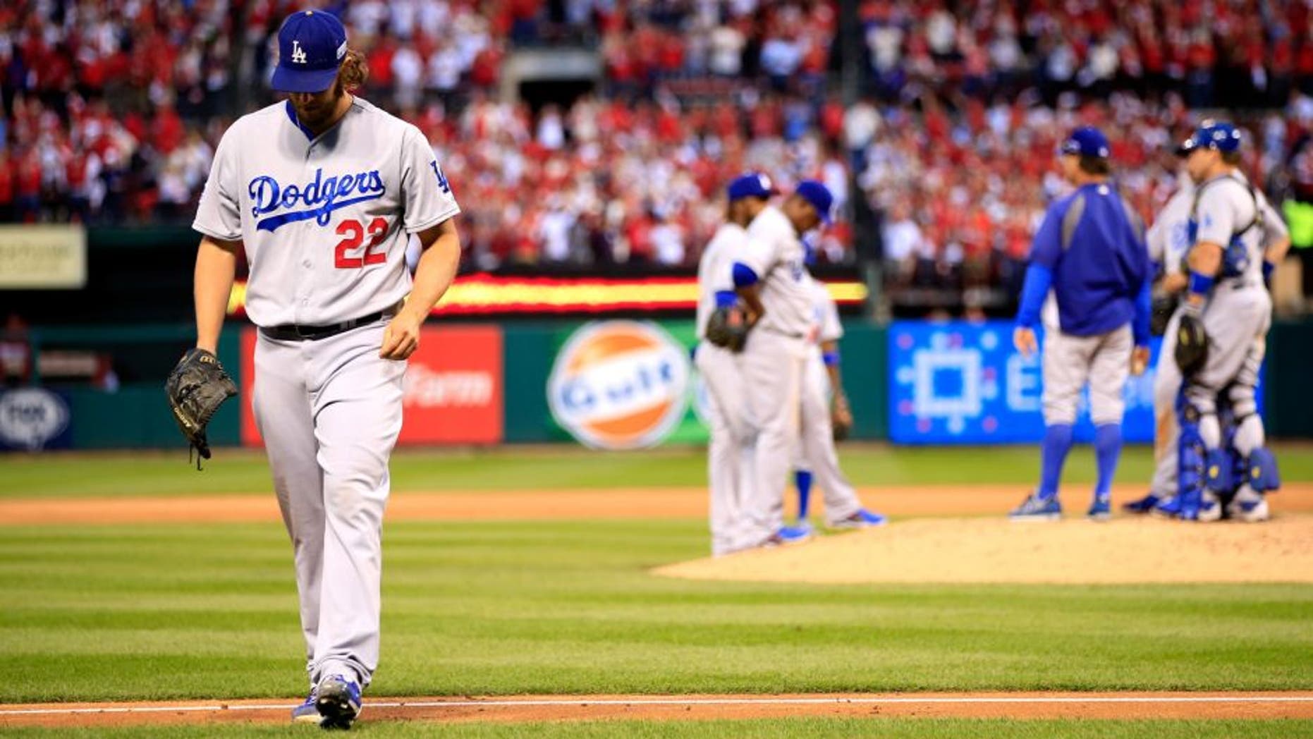 ST LOUIS, MO - OCTOBER 07: Clayton Kershaw #22 of the Los Angeles Dodgers exits the game in the seventh inning after giving up a three run home run against the St. Louis Cardinals in Game Four of the National League Divison Series at Busch Stadium on October 7, 2014 in St Louis, Missouri. (Photo by Jamie Squire/Getty Images)