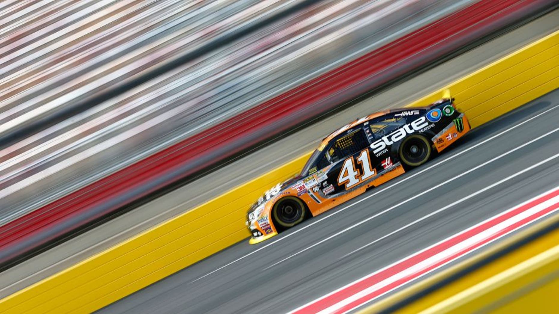 CHARLOTTE, NC - OCTOBER 09: Kurt Busch, driver of the #41 State Water Heaters Chevrolet, drives during practice for the NASCAR Sprint Cup Series Bank of America 500 at Charlotte Motor Speedway on October 9, 2015 in Charlotte, North Carolina. (Photo by Jonathan Ferrey/Getty Images)
