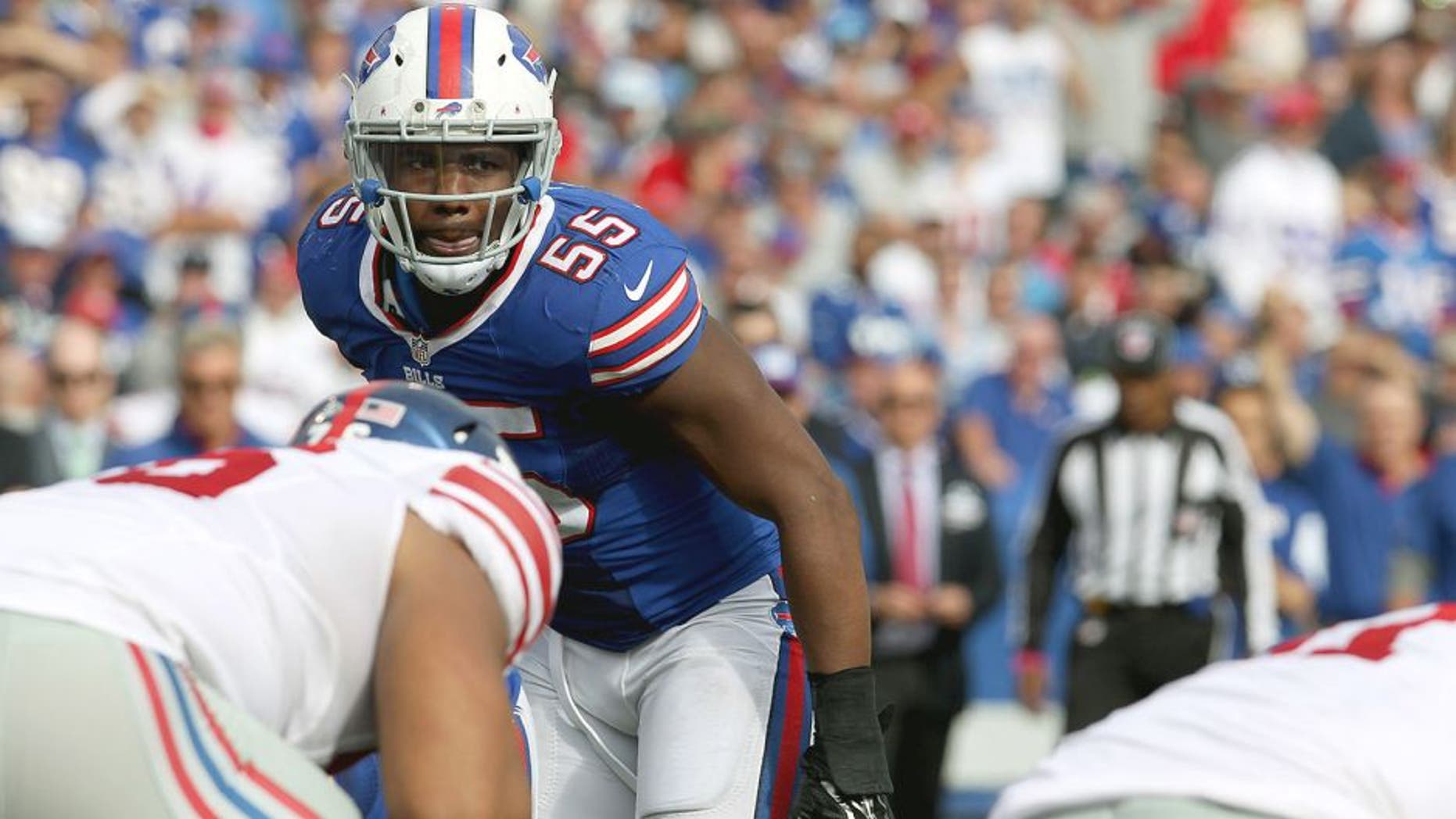 Oct 4, 2015; Orchard Park, NY, USA; Buffalo Bills defensive end Jerry Hughes (55) waits for the snap during the second half against the New York Giants at Ralph Wilson Stadium. Giants beat the Bills 24 to 10. Mandatory Credit: Timothy T. Ludwig-USA TODAY Sports