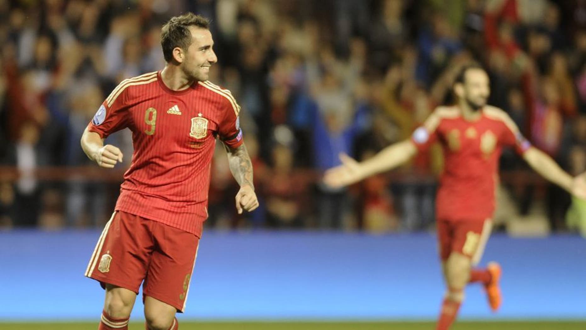 Spain's forward Paco Alcacer (L) celebrates after scoring during the Euro 2016 qualifying football match Spain vs Luxembourg at Las Gaunas stadium in Logrono on October 9, 2015. AFP PHOTO/ ANDER GILLENEA (Photo credit should read ANDER GILLENEA/AFP/Getty Images)