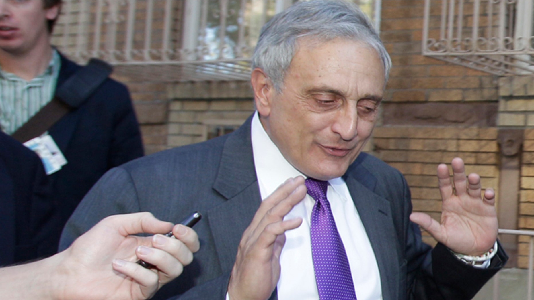 Oct. 10: New York Republican gubernatorial candidate Carl Paladino gestures after a reporter's question about prior controversial remarks while campaigning in the Borough Park and Williamsburg sections of the Brooklyn borough of New York.
