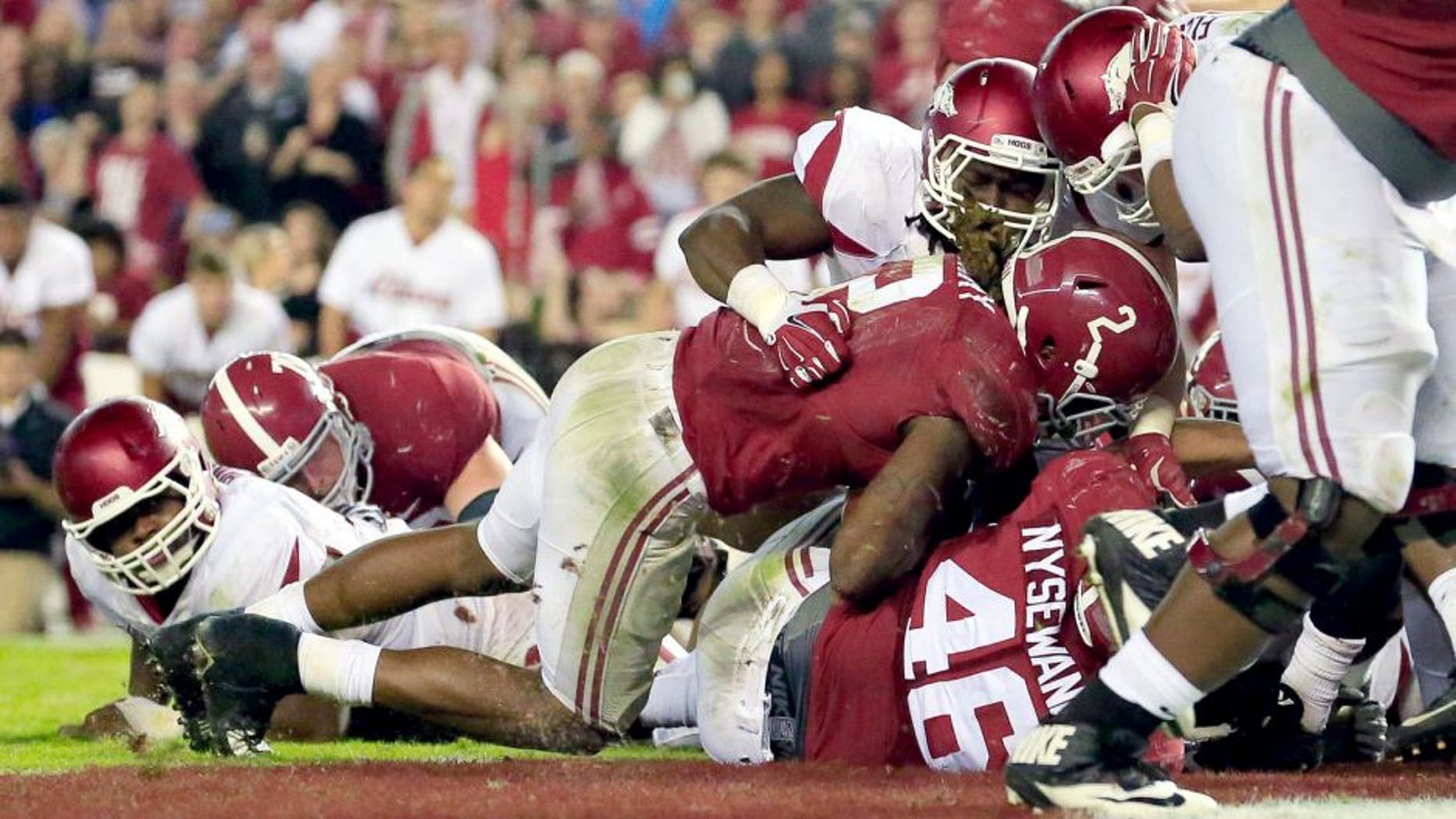Oct 10, 2015; Tuscaloosa, AL, USA; Alabama Crimson Tide running back Derrick Henry (2) scores a touchdown during the fourth quarter against Arkansas Razorbacks at Bryant-Denny Stadium. Alabama defeated Arkansas 27-14. Mandatory Credit: Marvin Gentry-USA TODAY Sports