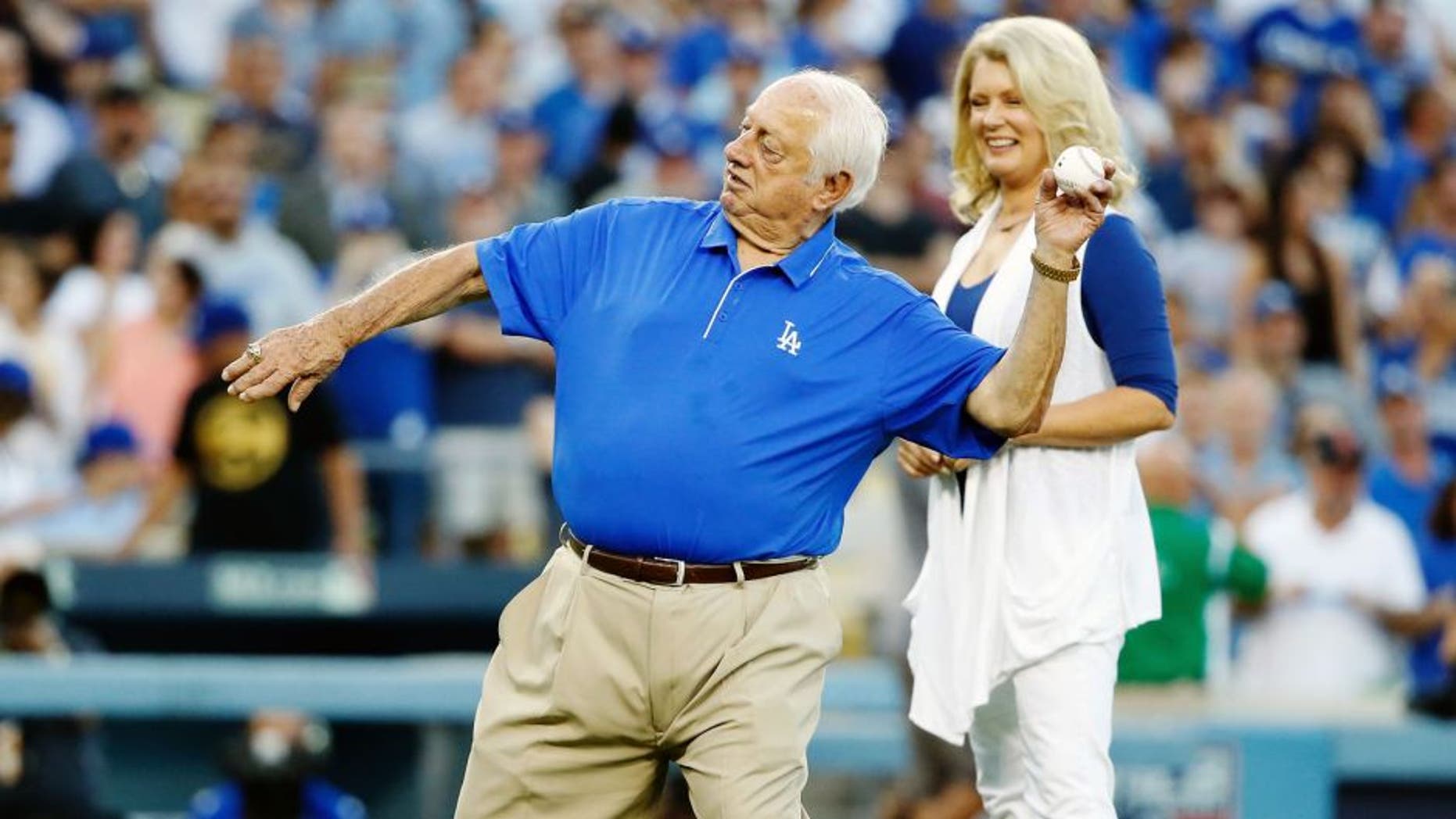 LOS ANGELES, CA - OCTOBER 10: Los Angeles Dodgers legend Tommy Lasorda throws out the ceremonial first pitch before the Dodgers take on the New York Mets in game two of the National League Division Series at Dodger Stadium on October 10, 2015 in Los Angeles, California. (Photo by Sean M. Haffey/Getty Images)