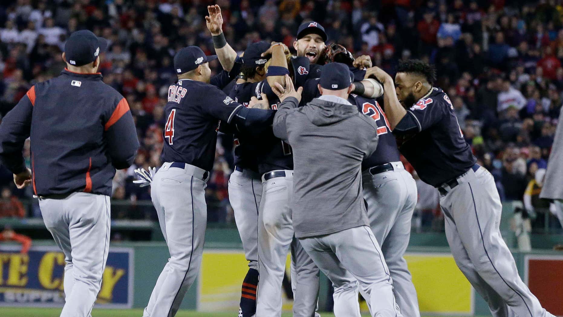 The Cleveland Indians celebrate their 4-3 win over the Boston Red Sox in Game 3 of baseball's American League Division Series, Monday, Oct. 10, 2016, in Boston.
