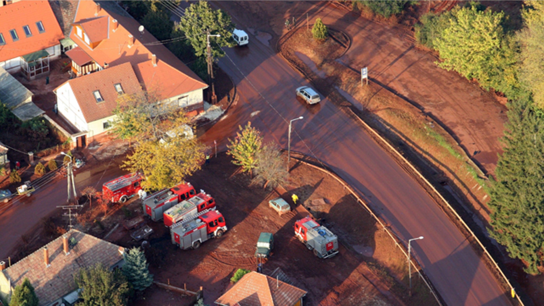 Oct. 10: An aerial view shows a street of the red mud-hit town Devecser 164 kms southwest of Budapest, Hungary.