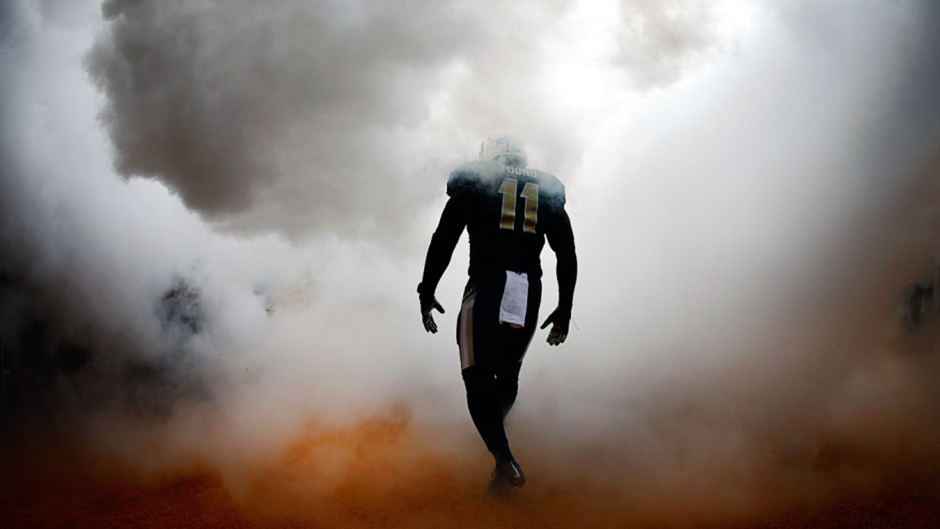WACO, TX - OCTOBER 11: Taylor Young #11 of the Baylor Bears walks on the field before taking on the TCU Horned Frogs at McLane Stadium on October 11, 2014 in Waco, Texas. (Photo by Tom Pennington/Getty Images)