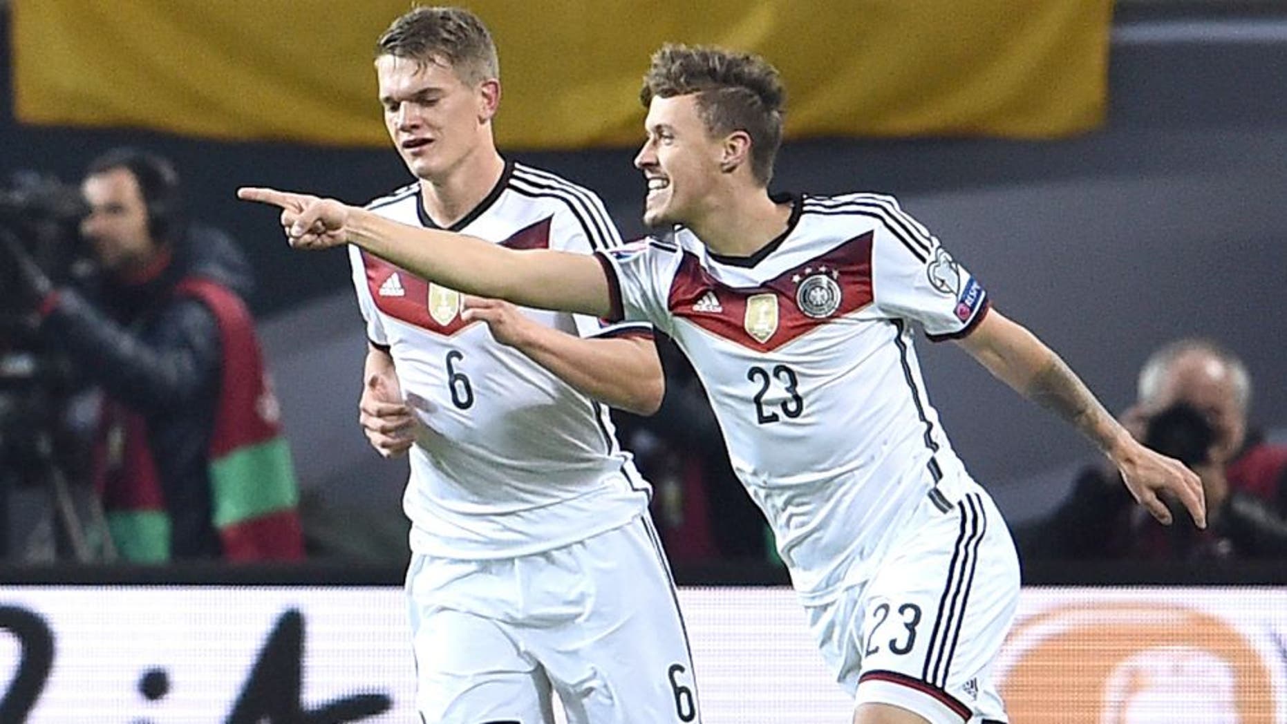 LEIPZIG, GERMANY - OCTOBER 11: Max Kruse of Germany (23) celebrates with team mate Matthias Ginter as he scores their second goal during the UEFA EURO 2016 Group D qualifying match between Germany and Georgia at Stadium Leipzig on October 11, 2015 in Leipzig, Germany. (Photo by Dennis Grombkowski/Bongarts/Getty Images)