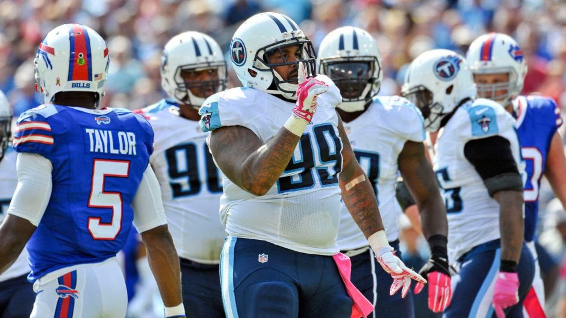 Oct 11, 2015; Nashville, TN, USA; Tennessee Titans defensive end Jurrell Casey (99) reacts to stopping Buffalo Bills running back Boom Herron (38) (not pictured) behind the line during the first half at Nissan Stadium. Mandatory Credit: Jim Brown-USA TODAY Sports